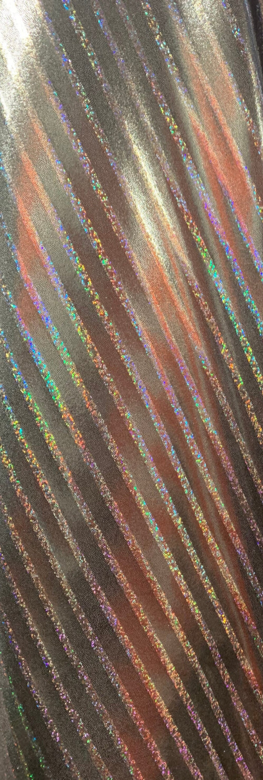 Metallic spandex stripes design w/ hologram foil 4-Stretch 58/60”sold by the YD. ships worldwide from Los Angeles California USA.