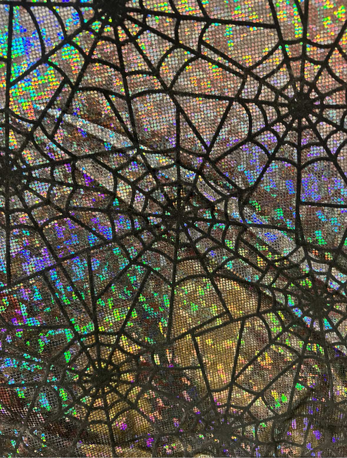 New Spiderwebs design print on hologram metallic nylon spandex with flocking 4-way stretch 58/60”sold by the YD.Ships worldwide from LA USA.