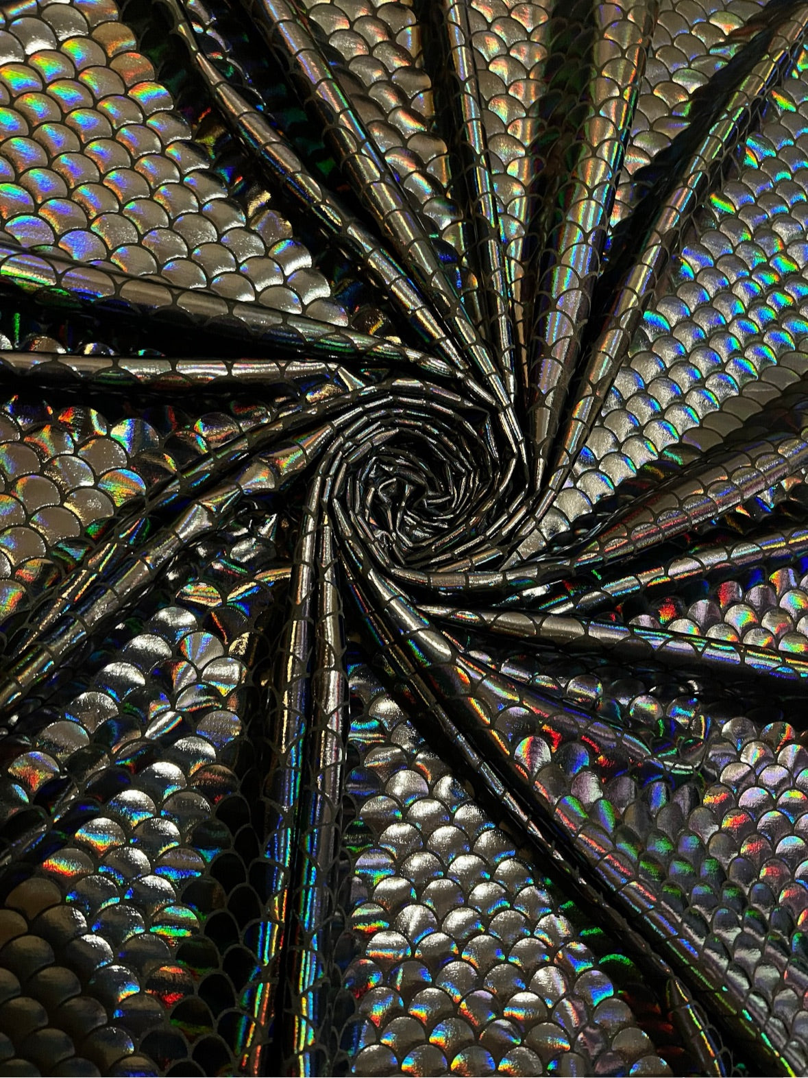 Hologram and iridescent mermaid scales print on nylon spandex 4-way stretch 58/60”Sold by the YD.Ships worldwide from Los Angeles California