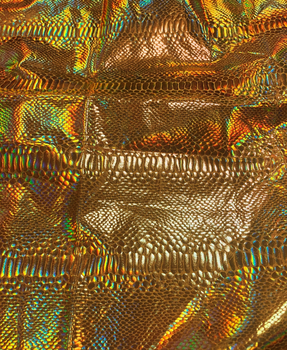 New iridescent foil snake skin design nylon spandex 4-stretch 58/60”sold by the YD.ships worldwide from Los Angeles California USA.