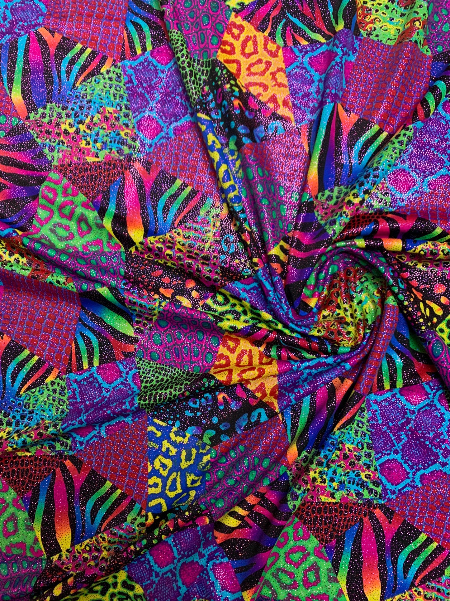 Multi Exotic animal print Multicolor print on best quality of nylon spandex with foil 4-way stretch 58/60” Sold by the YD. Ships Worldwide