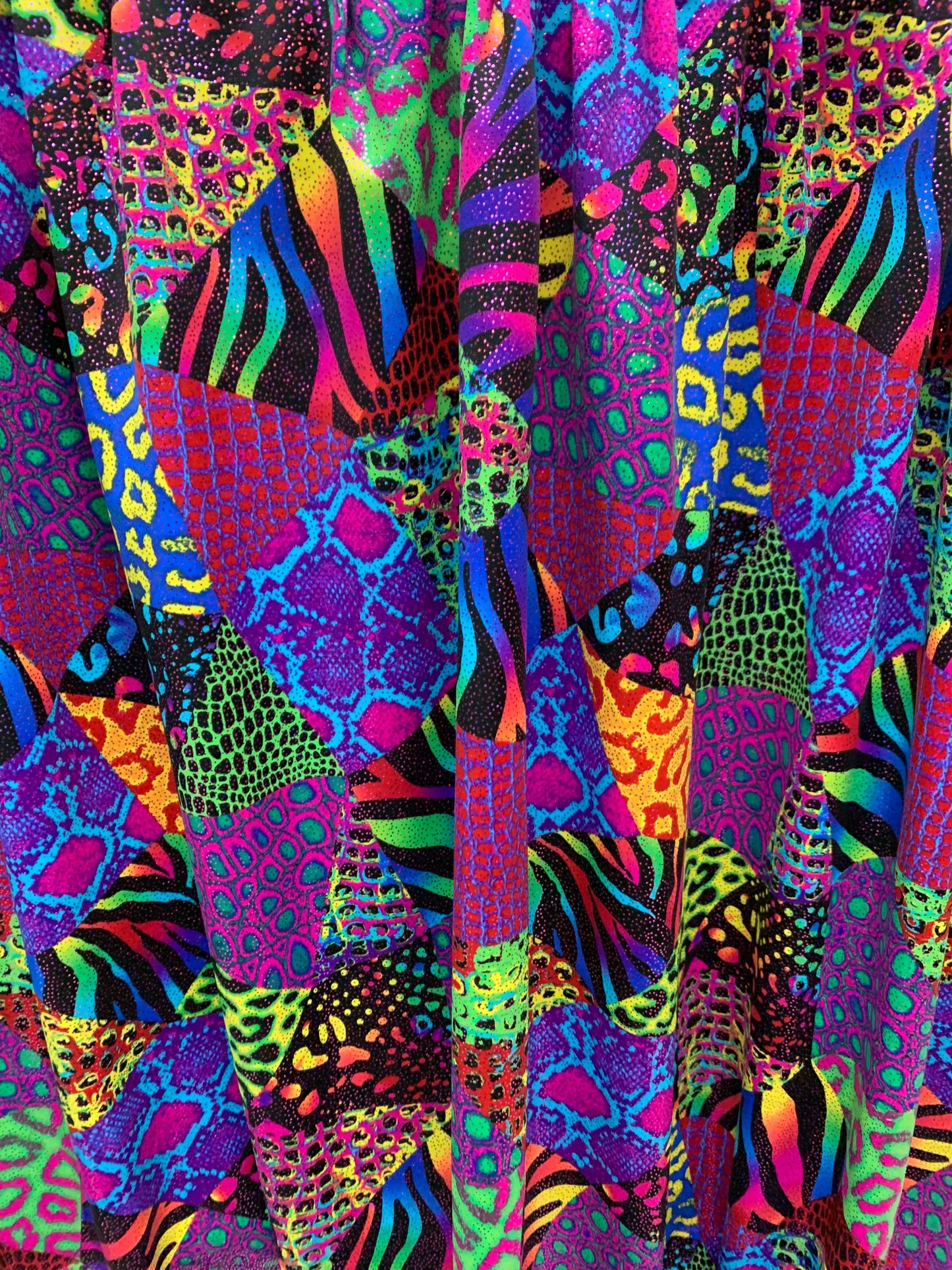 Multi Exotic animal print Multicolor print on best quality of nylon spandex with foil 4-way stretch 58/60” Sold by the YD. Ships Worldwide