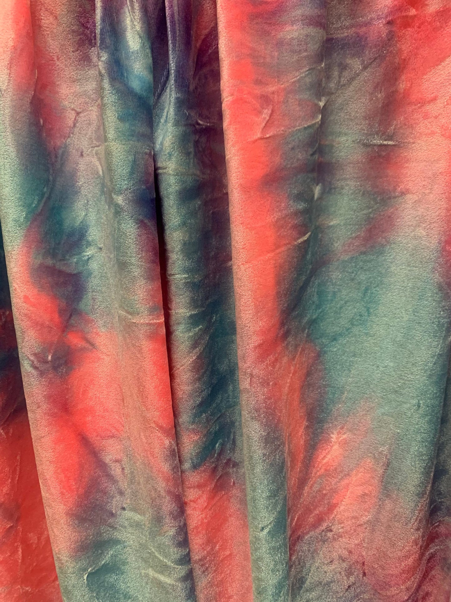 Tie dye stretch velvet multicolors 4 way stretch 58/60 inches sold by the YD. Ships Worldwide from Los Angeles California USA.