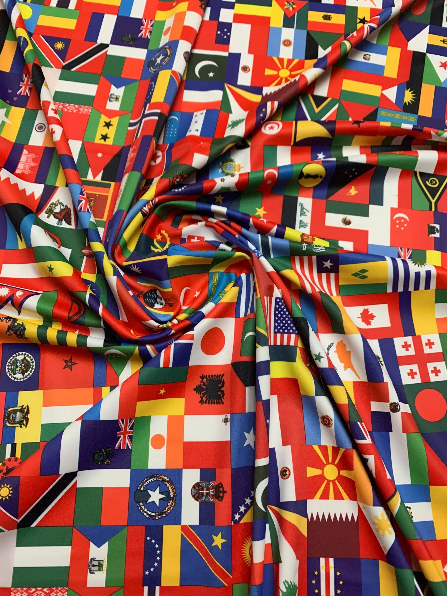 National flags design printed on nylon spandex 4-way stretch 58/60”sold by YD. ships worldwide from Los Angeles California USA.