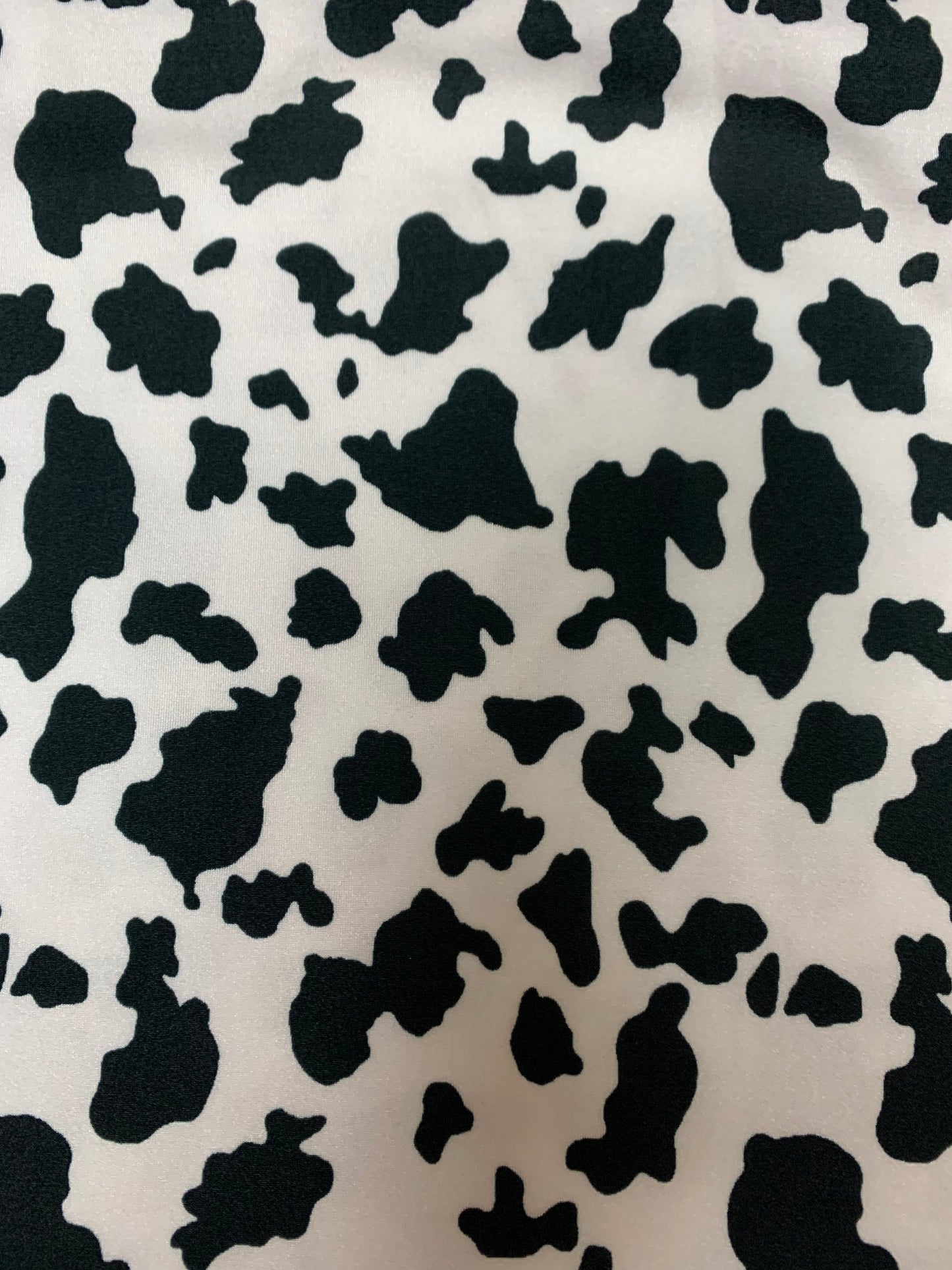Beautiful cow design print on poly spandex 4-way stretch medium weight 58/60 sold by the YD. ships worldwide from Los Angeles California USA