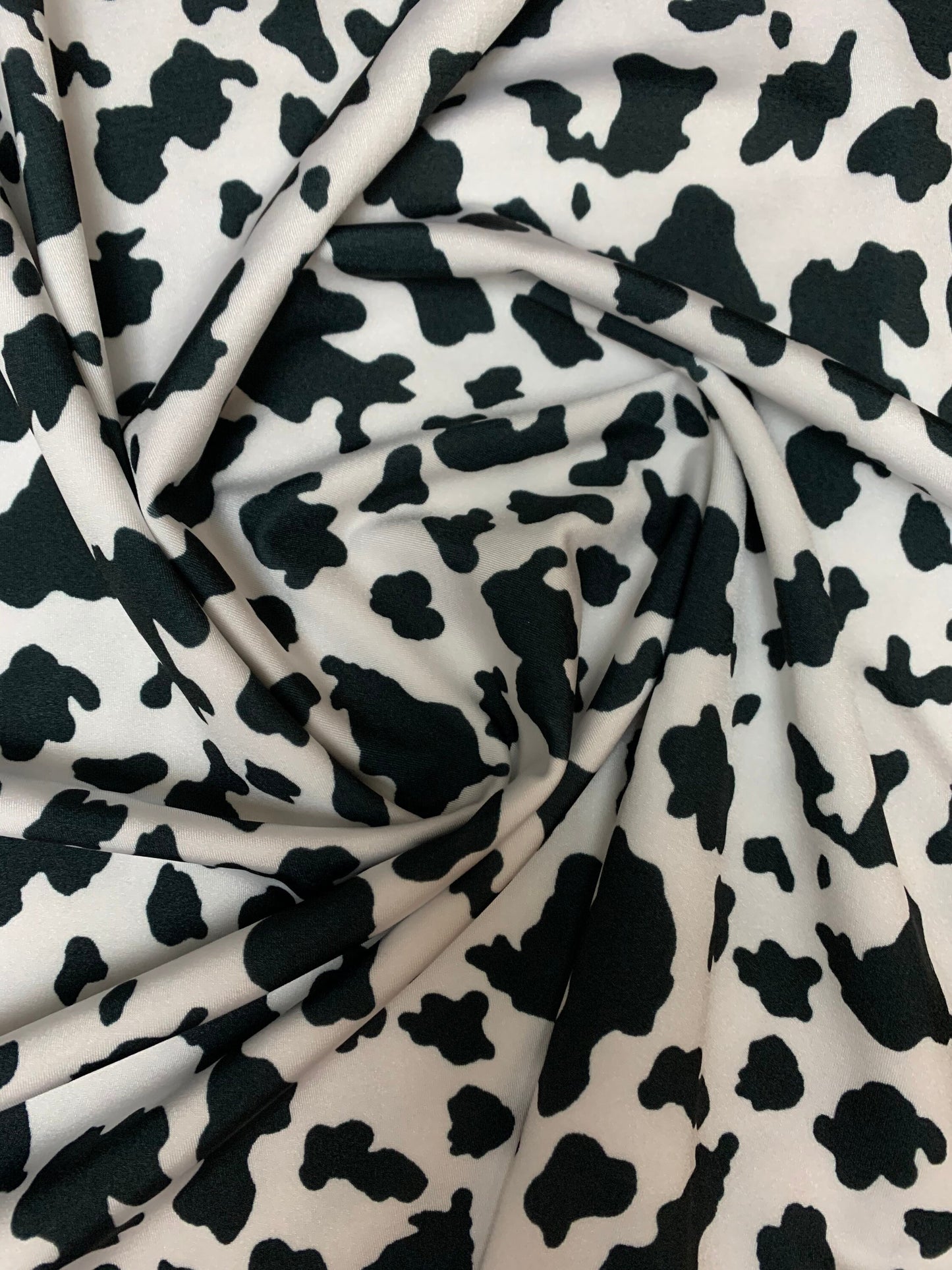 Beautiful cow design print on poly spandex 4-way stretch medium weight 58/60 sold by the YD. ships worldwide from Los Angeles California USA