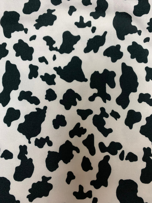 Beautiful cow design print on poly spandex 4-way stretch medium weight 58/60 sold by the YD. ships worldwide from Los Angeles California USA