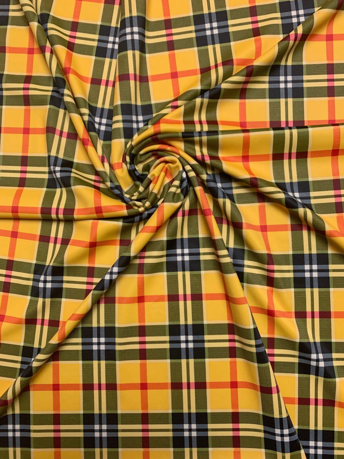 New luxery tartan design print on the best quality nylon spandex 4- way stretch 58/60”solid by the YD. ships Worldwide from Los Angeles
