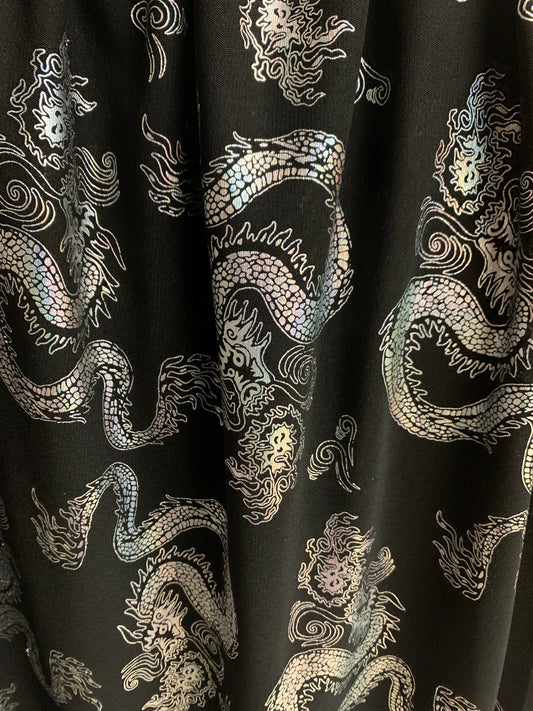 Dragon design iridescent silver power mesh nylon spandex 4-way stretch 58/60”sold by the YD.ships worldwide from Los Angeles California USA