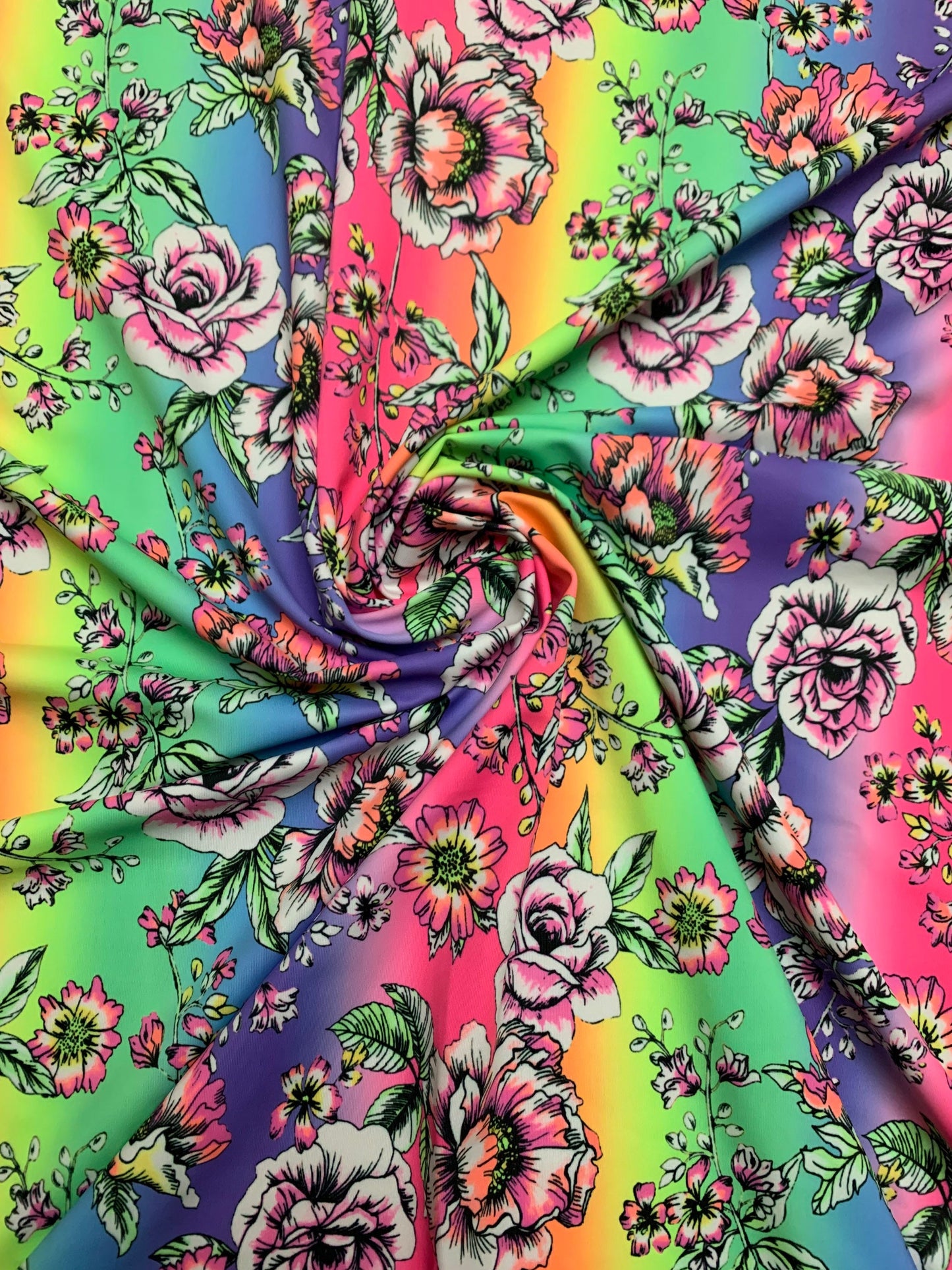 Rainbow and roses design print on the best quality nylon spandex 4-way stretch 58/60”sold by the DY. Ships Worldwide from Los  Angeles CA.