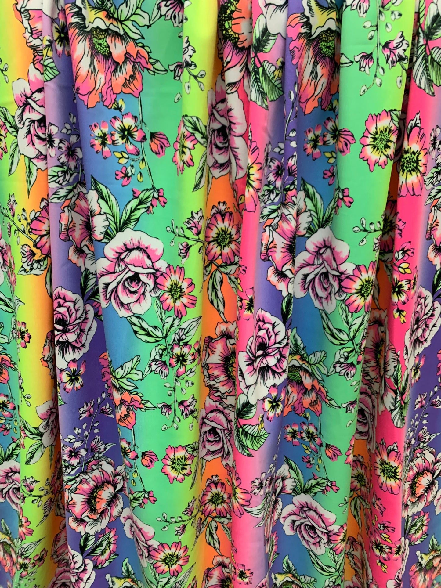 Rainbow and roses design print on the best quality nylon spandex 4-way stretch 58/60”sold by the DY. Ships Worldwide from Los  Angeles CA.