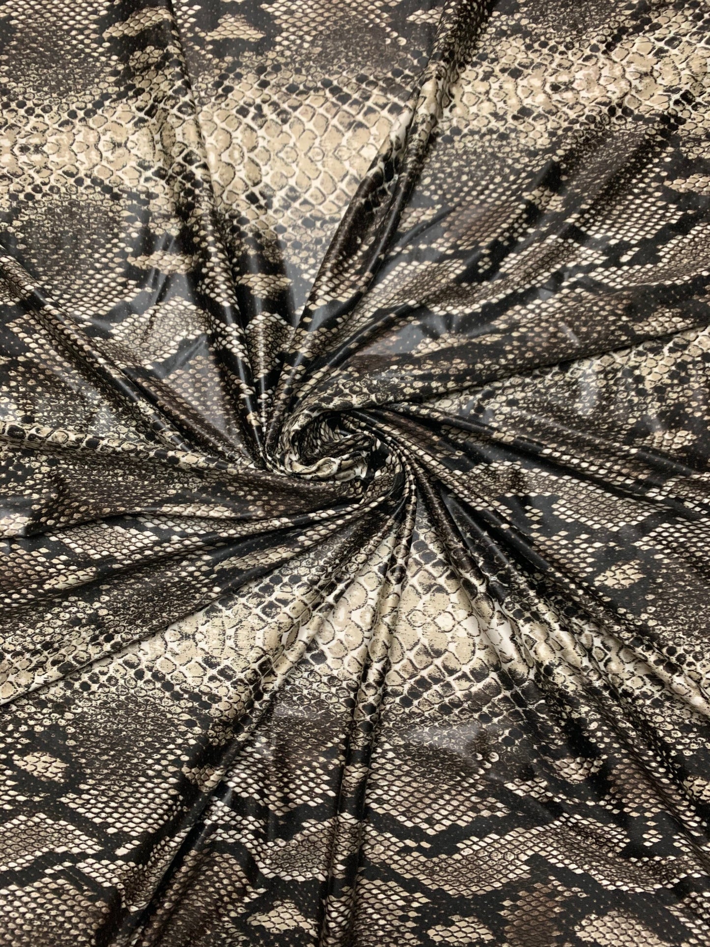 Snake skin pattern design print on nylon spandex 4-way stretch 58/60”sold by the YD. ships worldwide from Los Angeles California USA