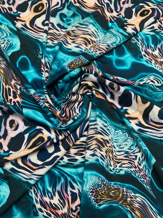 Abstract animal print on the best quality nylon spandex4-way stretch 58/60”sold by the YD. ships Worldwide from Los Angeles California USA