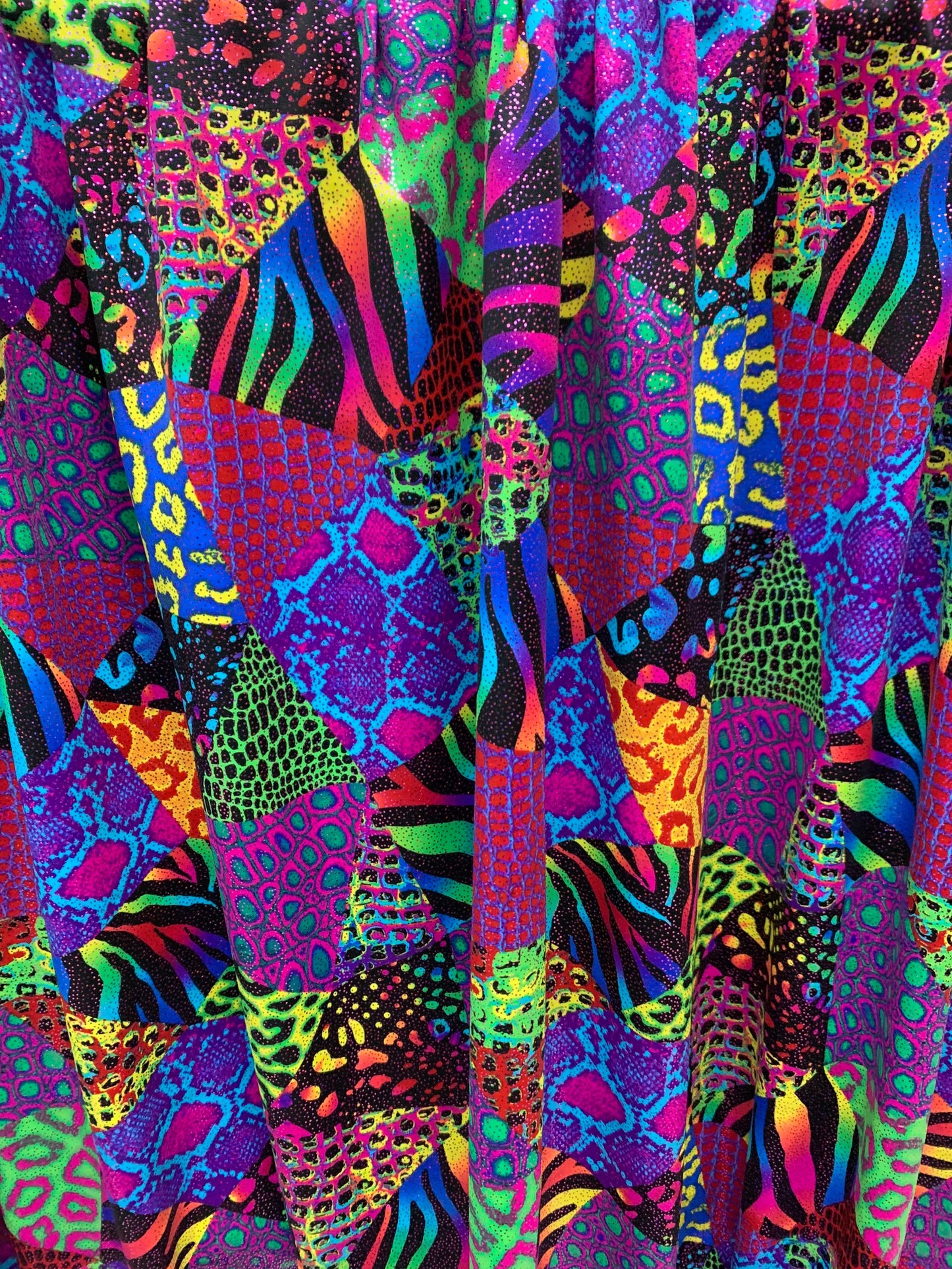 Multi Exotic animal print Multicolor print on best quality of nylon spandex with foil 4-way stretch 58/60” Sold by the YD. Ships Worldwide