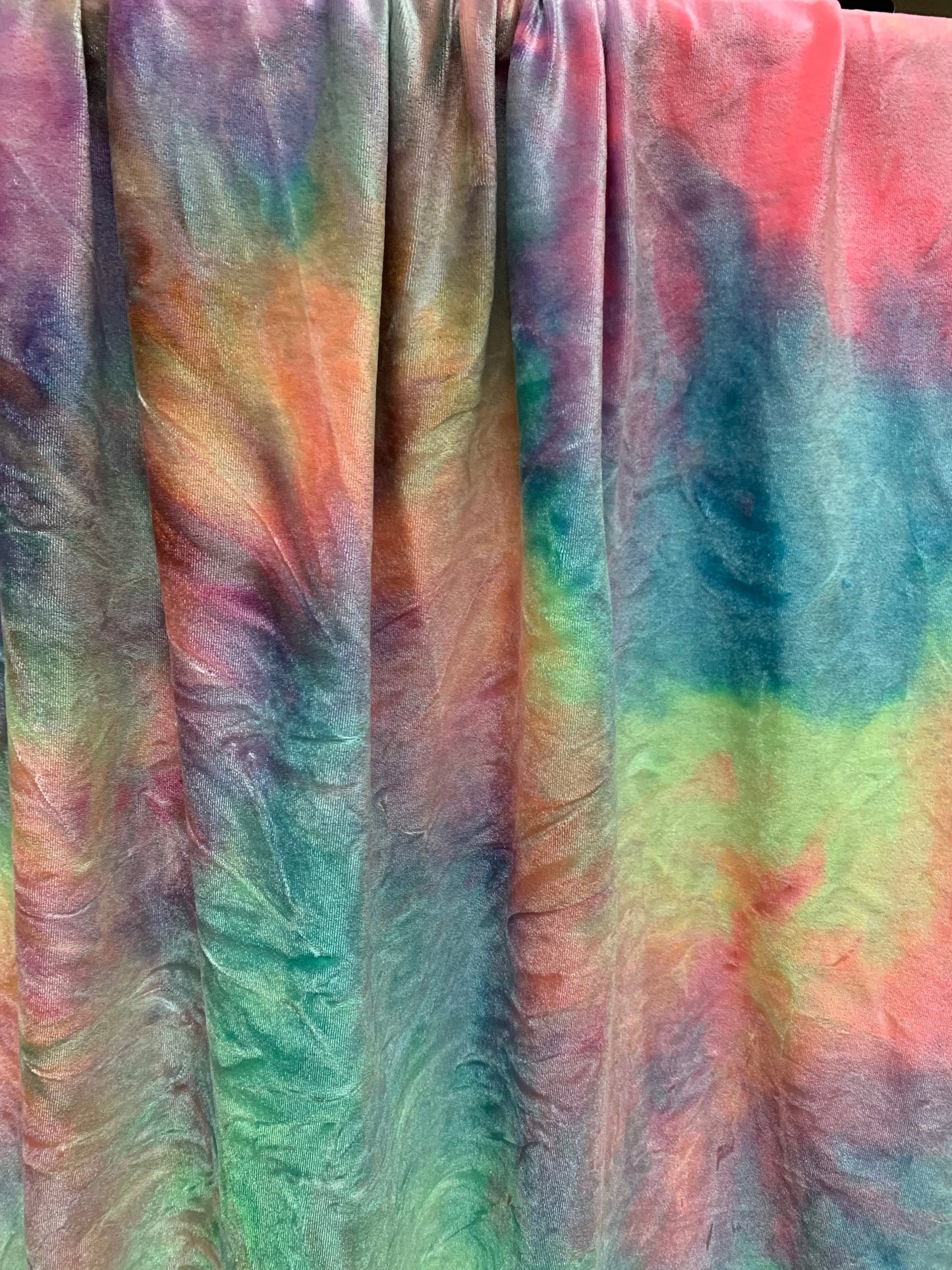 Tie dye stretch velvet multicolors 4 way stretch 58/60 inches sold by the YD. Ships Worldwide from Los Angeles California USA.