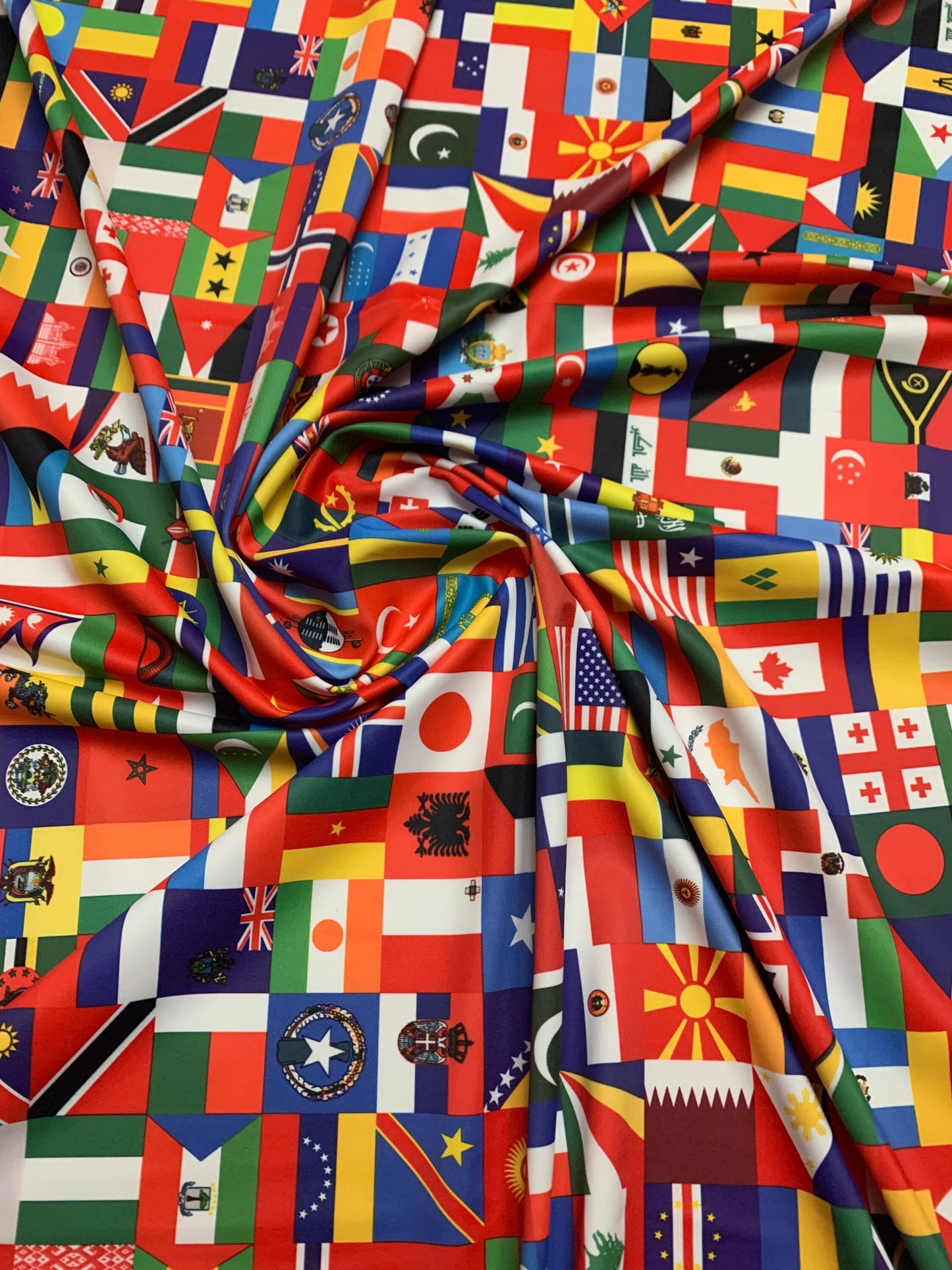 National flags design printed on nylon spandex 4-way stretch 58/60”sold by YD. ships worldwide from Los Angeles California USA.