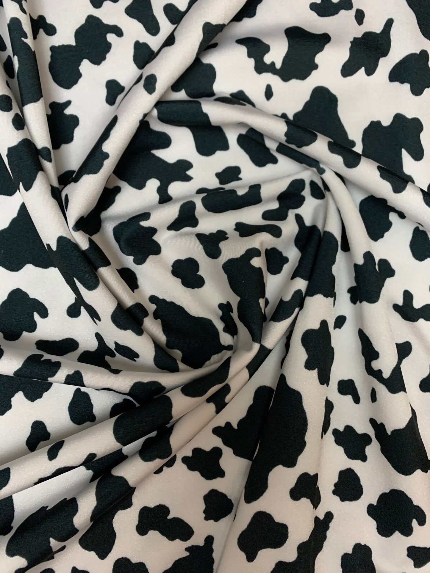 Beautiful cow design print on poly spandex 4-way stretch medium weight 58/60 sold by the YD. ships worldwide from Los Angeles California USA