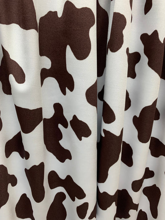 Beautiful cow design print on best quality of nylon spandex 4-way stretch 58/60”sold by the YD. ships Worldwide from Los Angeles CA USA.