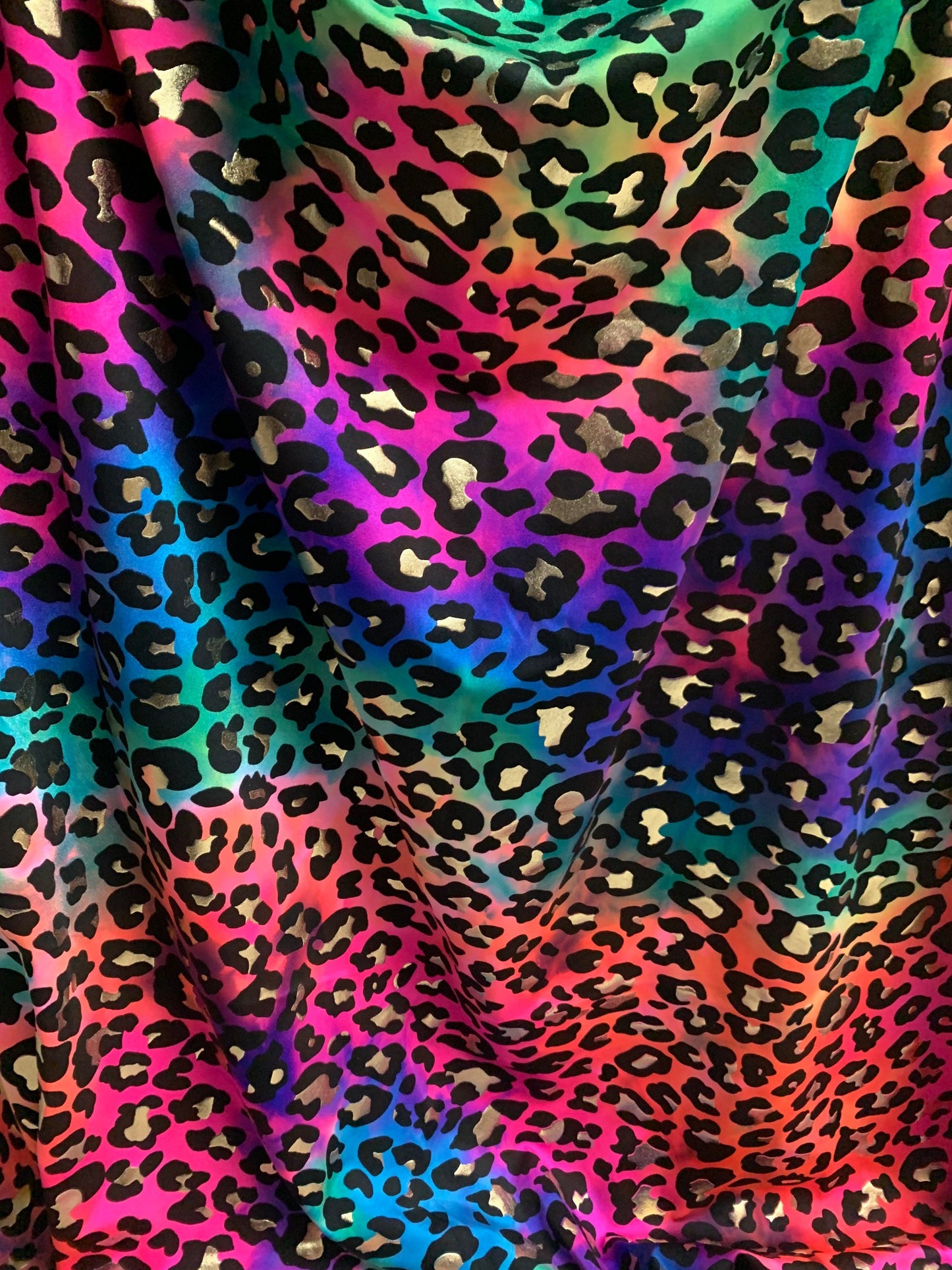 New Leopard tie dye color print on the best quality nylon spandex 4-way stretch 58/60”sold by the YD. ships worldwide from Los Angeles CA.