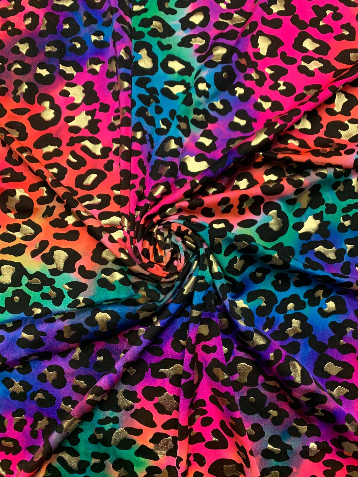 New Leopard tie dye color print on the best quality nylon spandex 4-way stretch 58/60”sold by the YD. ships worldwide from Los Angeles CA.