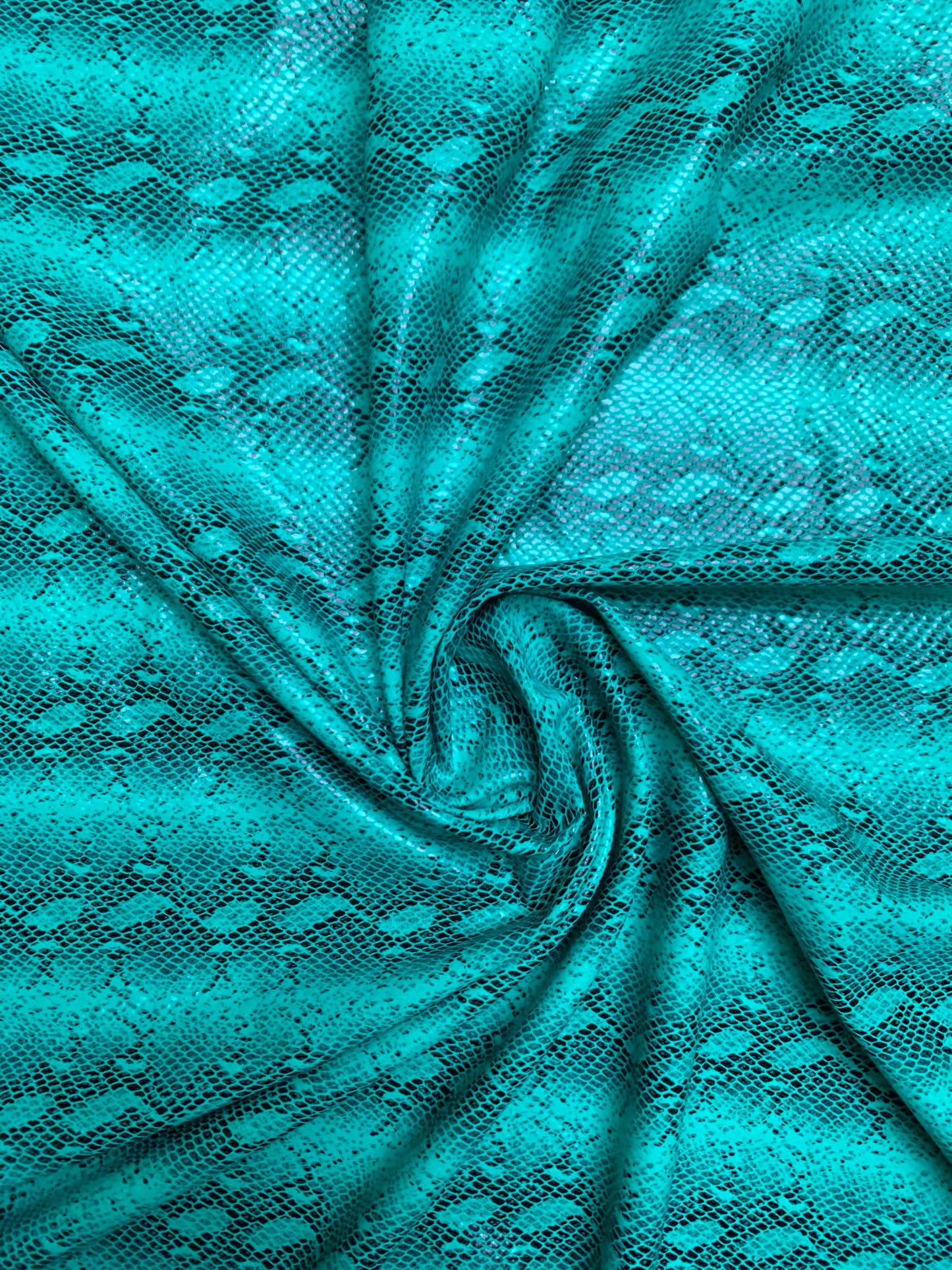 Skin snake pattern design print on the best quality nylon spandex with clear foil 4-way stretch 58/60”sold by the YD.ships worldwide from Los Angeles CA USA