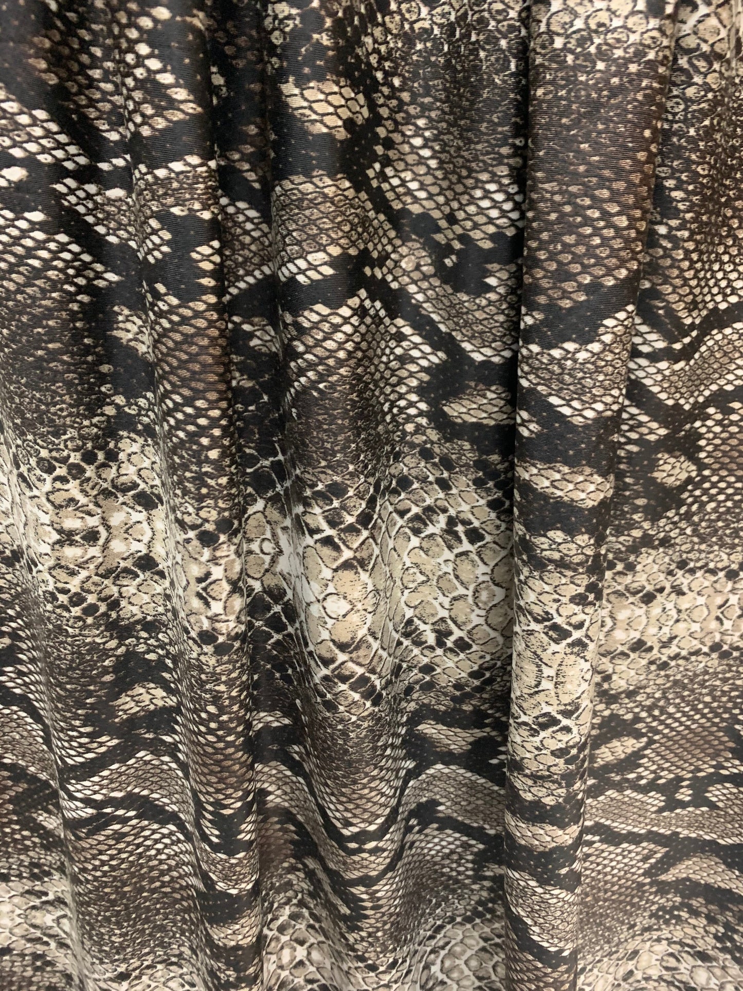 Snake skin pattern design print on nylon spandex 4-way stretch 58/60”sold by the YD. ships worldwide from Los Angeles California USA