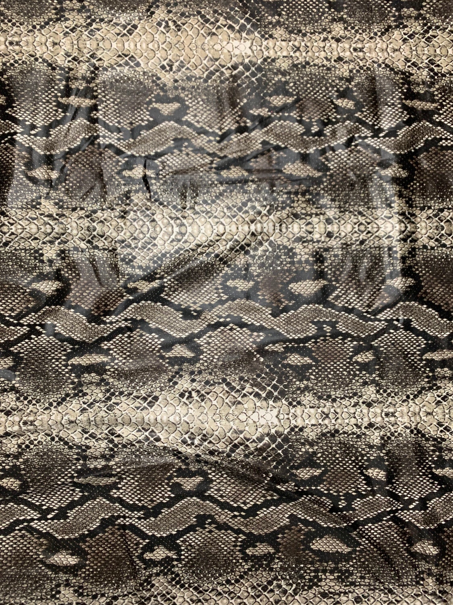 Snake skin pattern design print on nylon spandex 4-way stretch 58/60”sold by the YD. ships worldwide from Los Angeles California USA