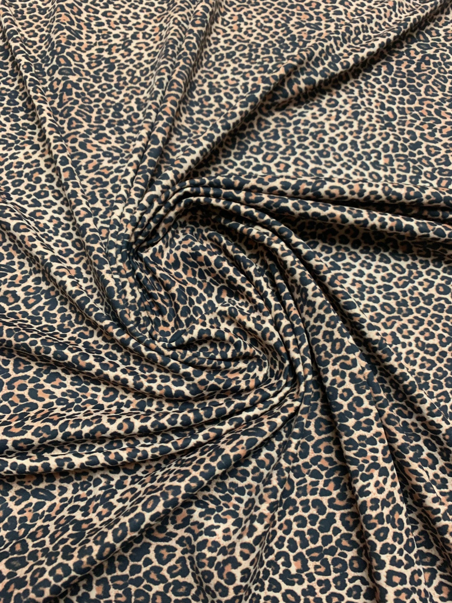 Small cheetah design print on the best quality nylon spandex 4-way stretch 58/60”sold by the YD.ships worldwide from Los Angeles CA USA.