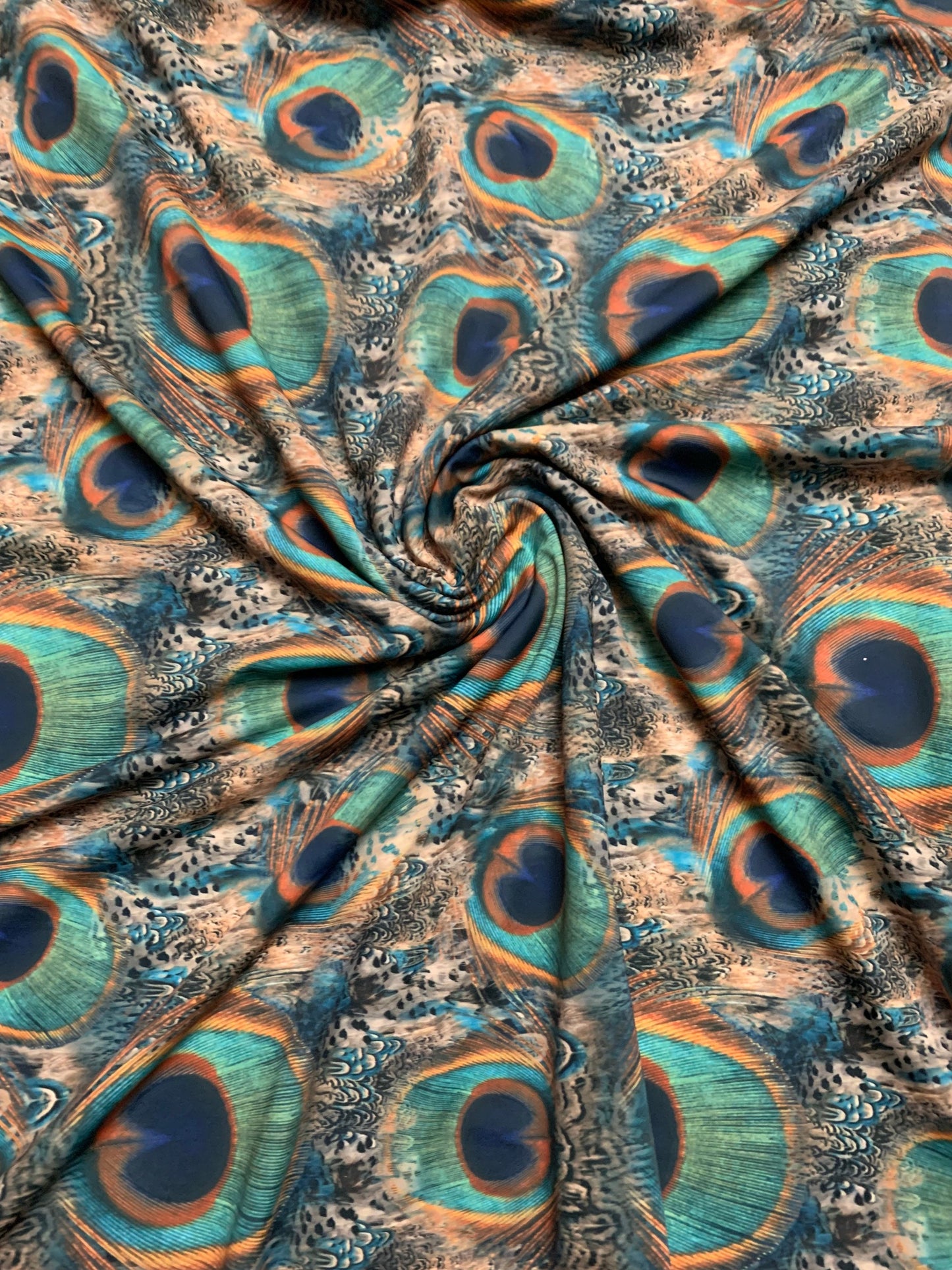 New peacock design print on the best quality nylon spandex4-way stretch 58/60”sold by the YD.ships worldwide from Los Ángeles California USA