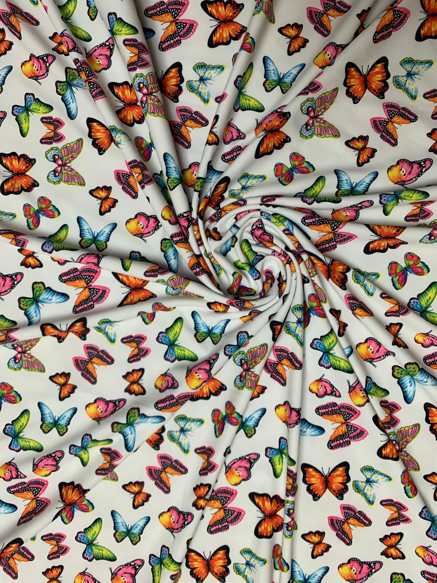 Wild summer butterfly design print on nylon spandex 4-way stretch 58/60”sold by the YD.ships worldwide from Los Ángeles California USA.