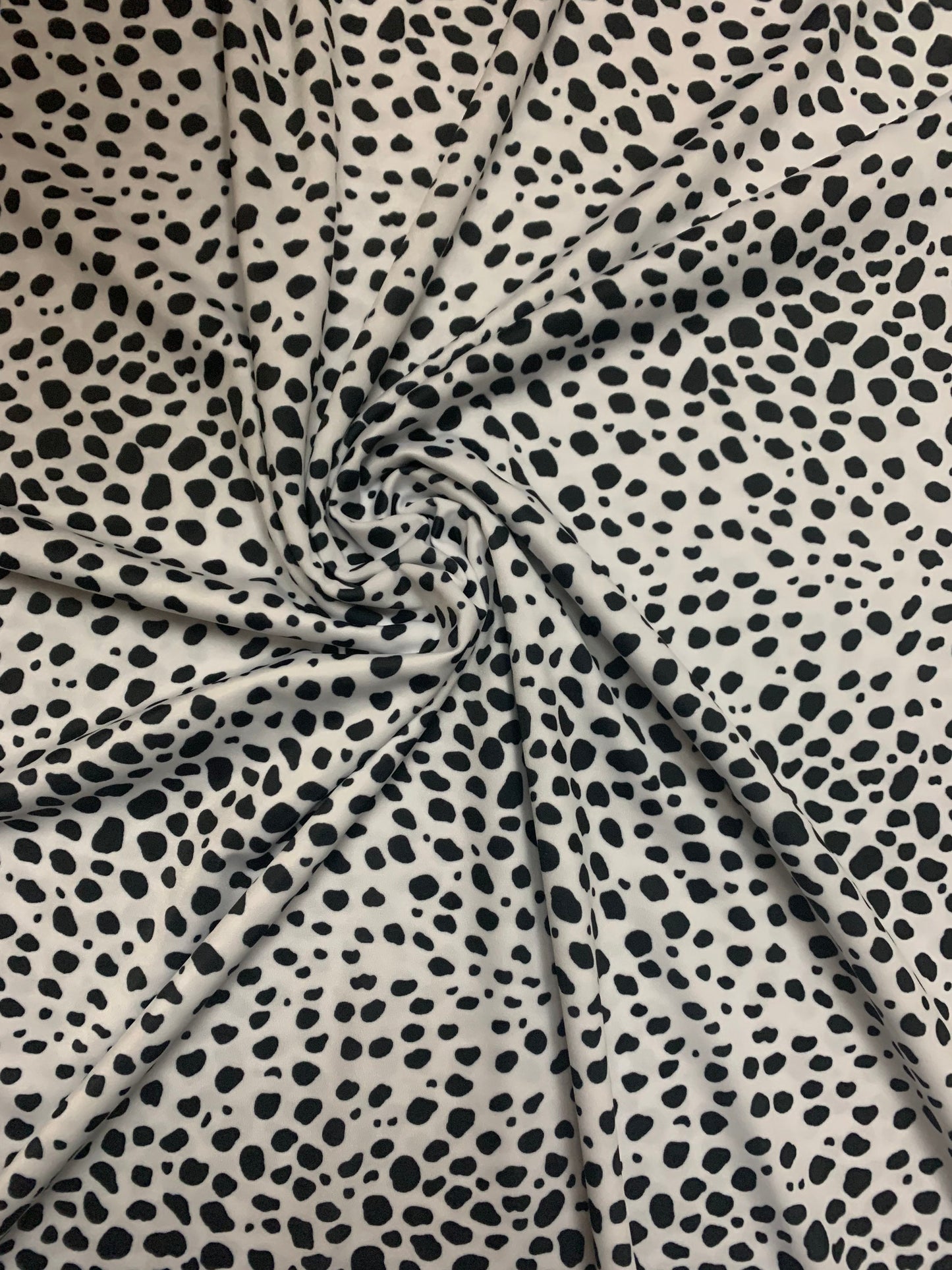 Pretty Dalmatian design print on the best quality of nylon spandex 4-way stretch 58/60”sold by the YD.ships worldwide from Los Angeles CA.