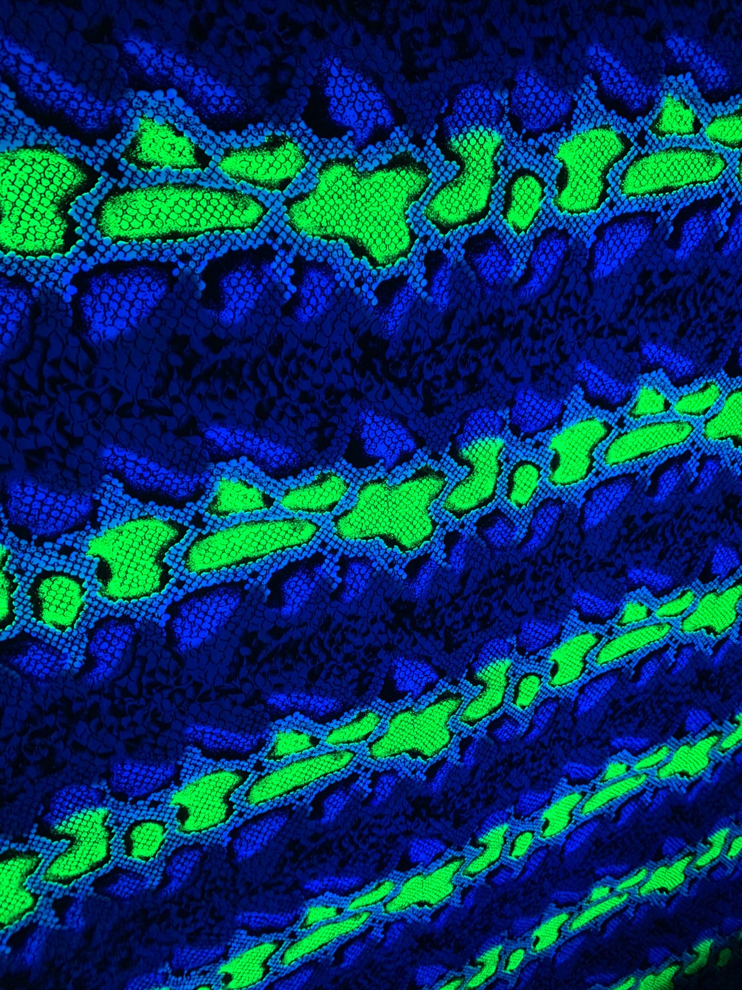 New skin snake design poly power mesh 4-stretch it glows in the dark with black light 58/60” Sold by the YD. Ships Worldwide LA.CA