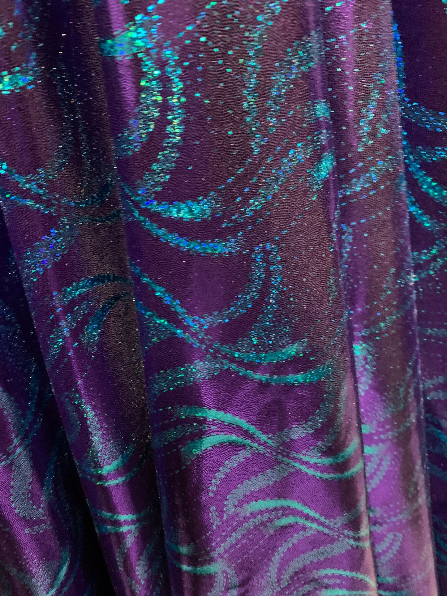 New waves abstract design metallic all over foil nylon spandex 4-way stretch 58/60”sold by the YD. ships worldwide from Los Angeles CA USA.