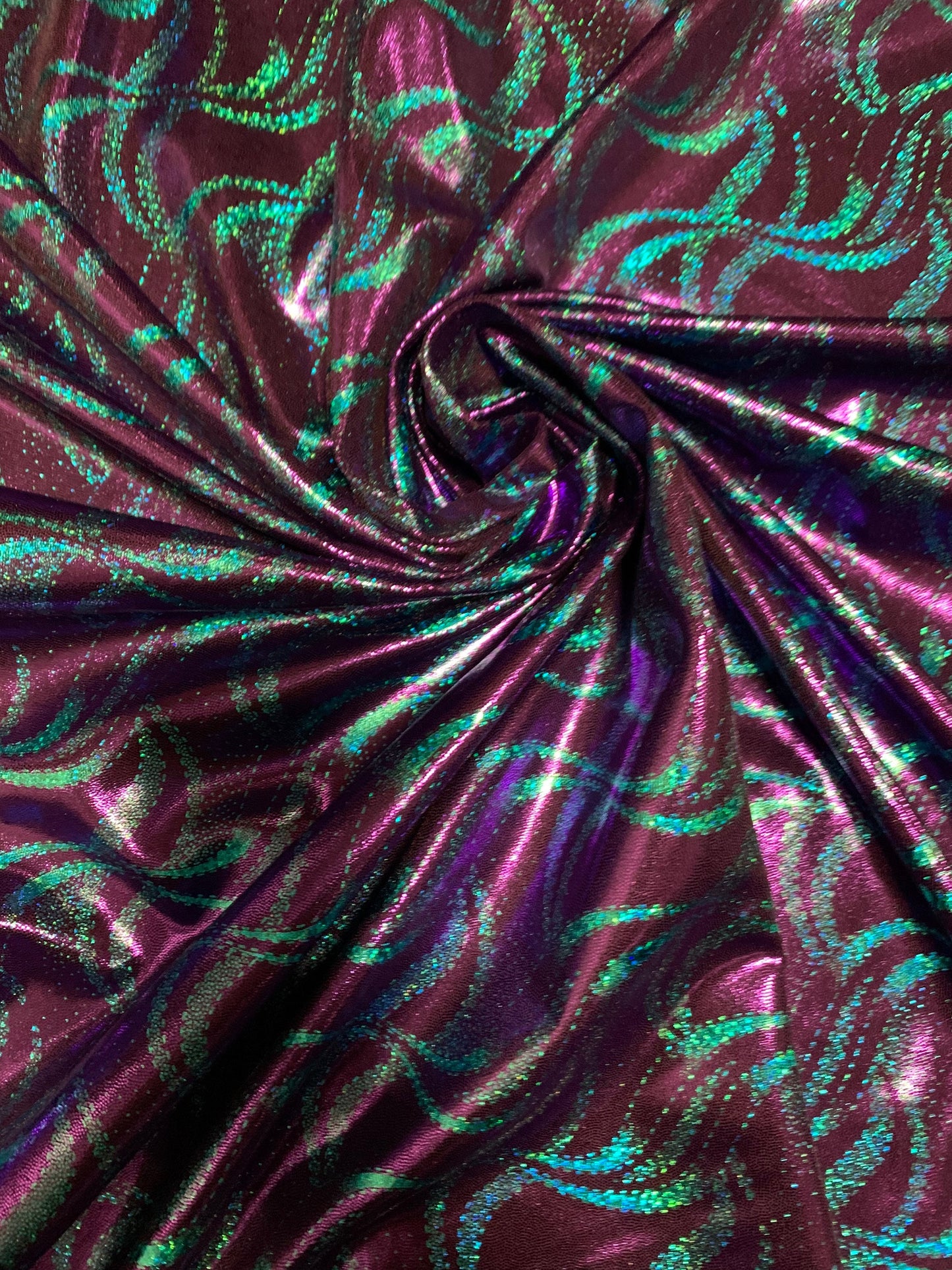 New waves abstract design metallic all over foil nylon spandex 4-way stretch 58/60”sold by the YD. ships worldwide from Los Angeles CA USA.