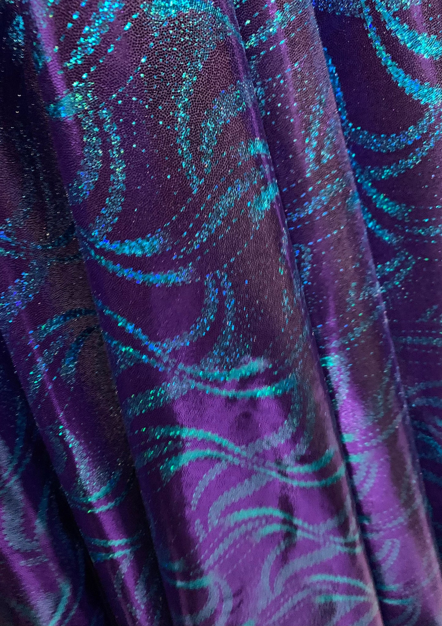 New waves abstract design metallic all over foil nylon spandex 4-way stretch 58/60”sold by the YD. ships worldwide from Los Angeles CA USA.