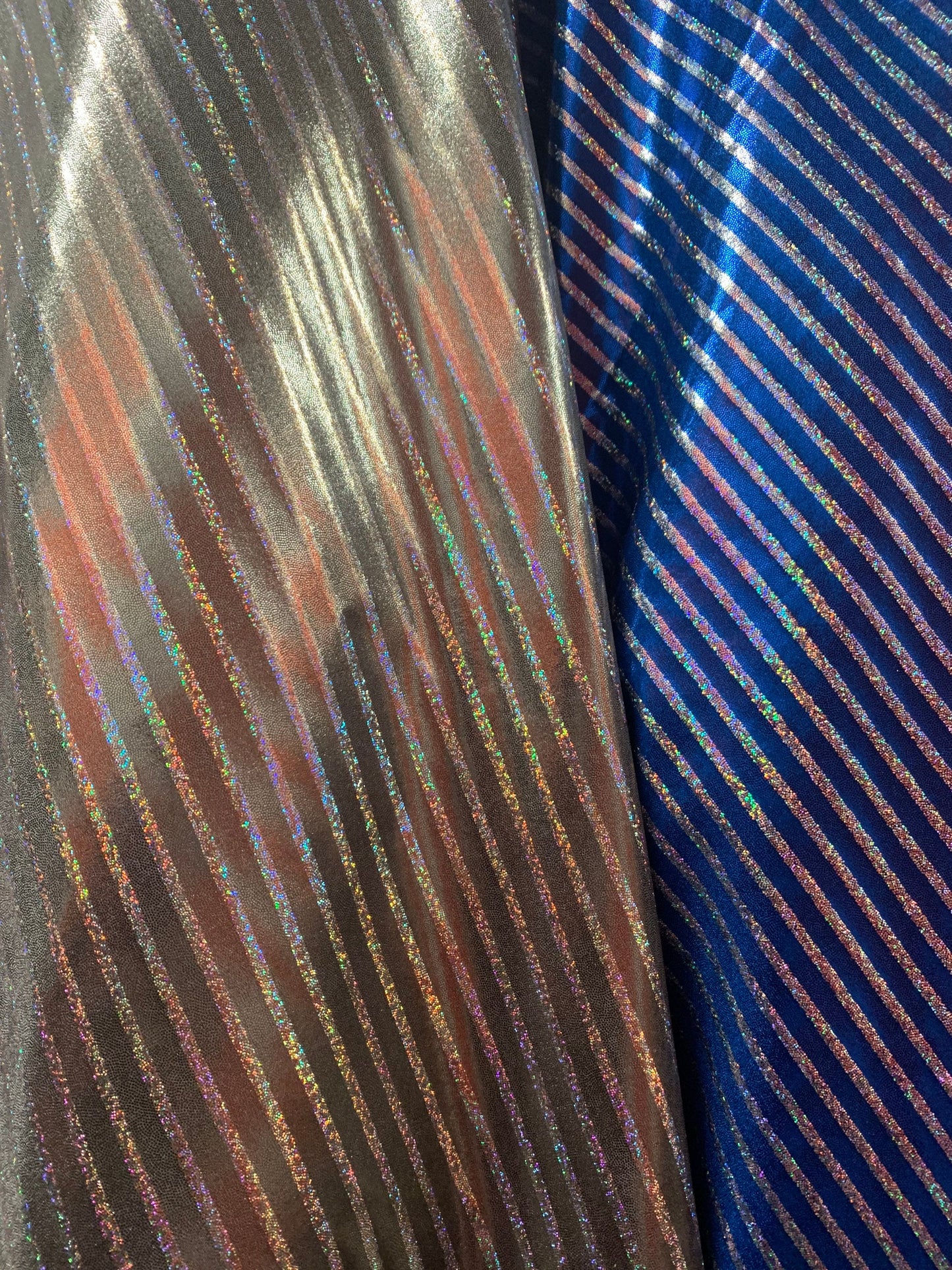 Metallic spandex stripes design w/ hologram foil 4-Stretch 58/60”sold by the YD. ships worldwide from Los Angeles California USA.