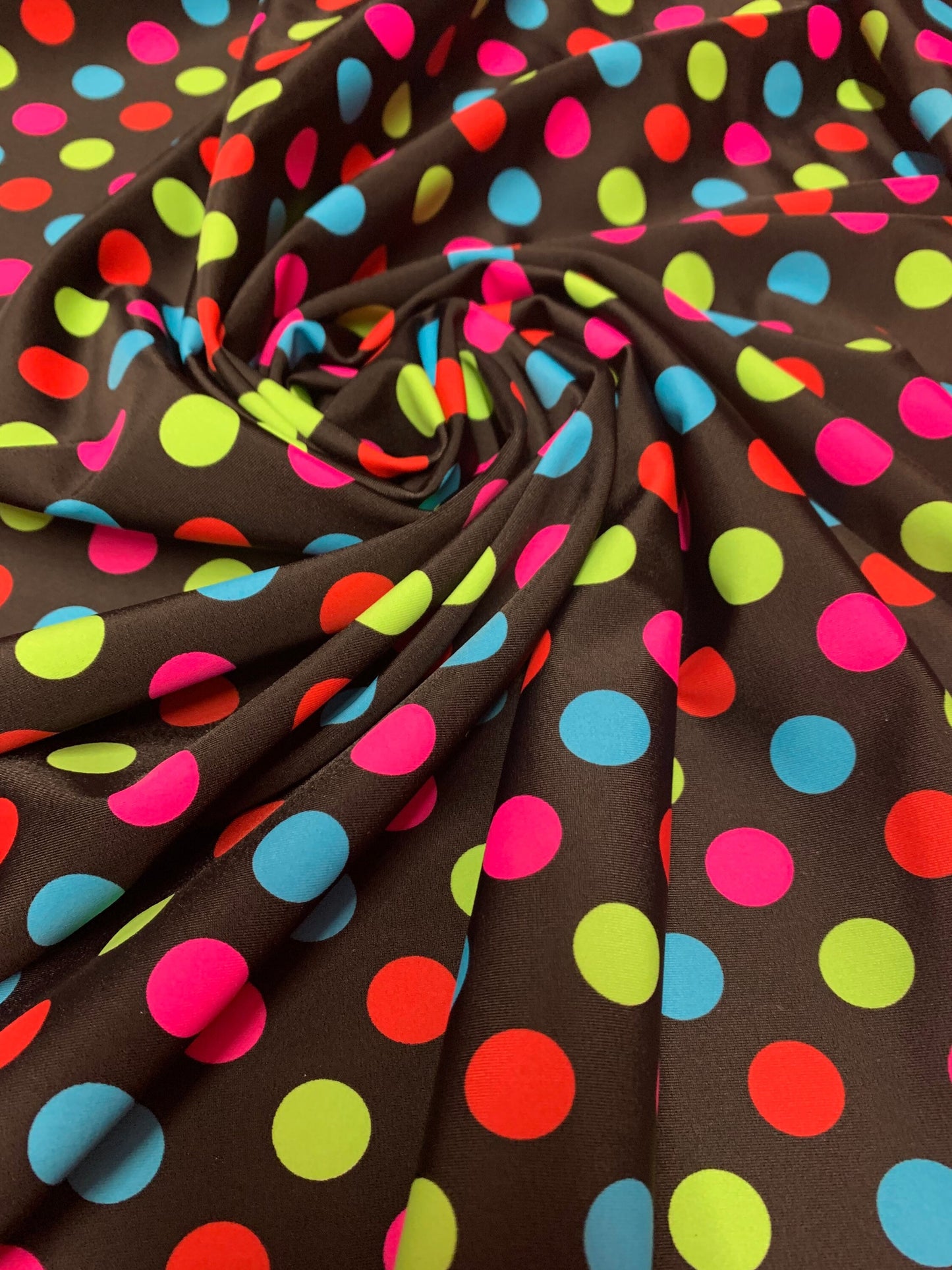 Colorful polka dot design print on the best quality of nylon spandex 4-stretch 58/60”sold by the YD.Ships worldwide from Los Angeles CA USA.