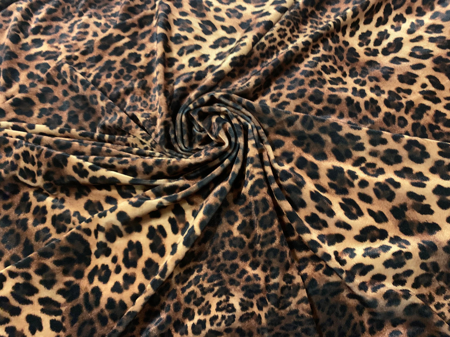 Cheetah animal design print on stretch velvet 4way-stretch sold by the YD. Ships Worldwide from Los Angeles California USA.