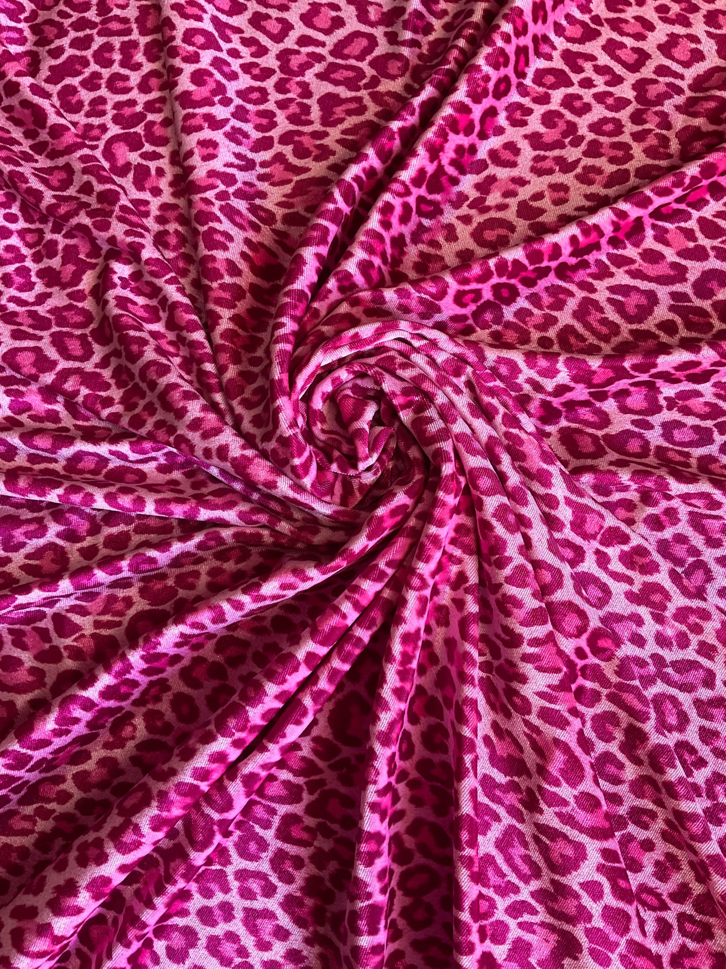 Pretty leopard design print on velvet 420gms 4way stretch 58/60”sold by the YD. Ships worldwide from Los Angeles California USA.