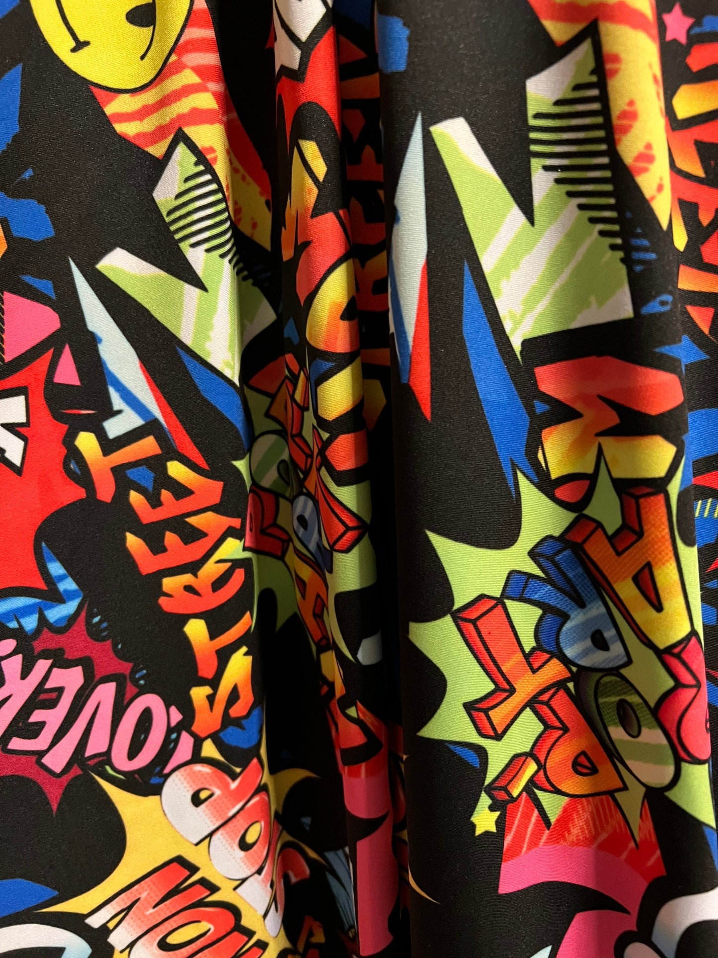 Fashion graffiti design print on the best quality of nylon spandex 4-way stretch 58/60”sold by the YD.ships worldwide from Los Angeles CA