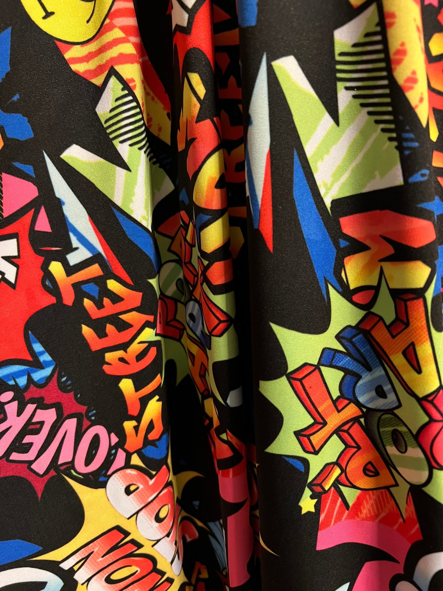 Fashion graffiti design print on the best quality of nylon spandex 4-way stretch 58/60”sold by the YD.ships worldwide from Los Angeles CA