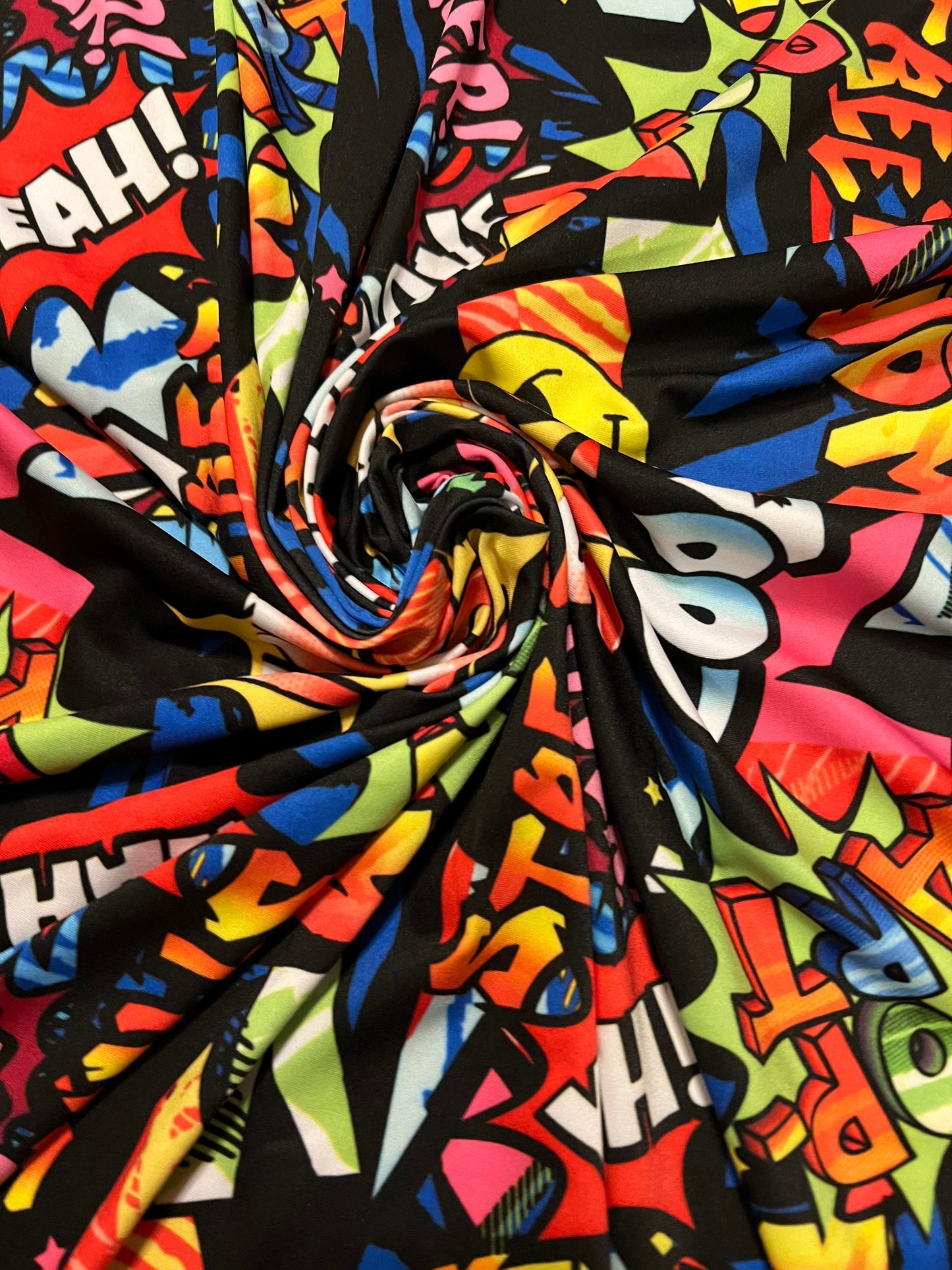 Fashion graffiti design print on the best quality of nylon spandex 4-way stretch 58/60”sold by the YD.ships worldwide from Los Angeles CA