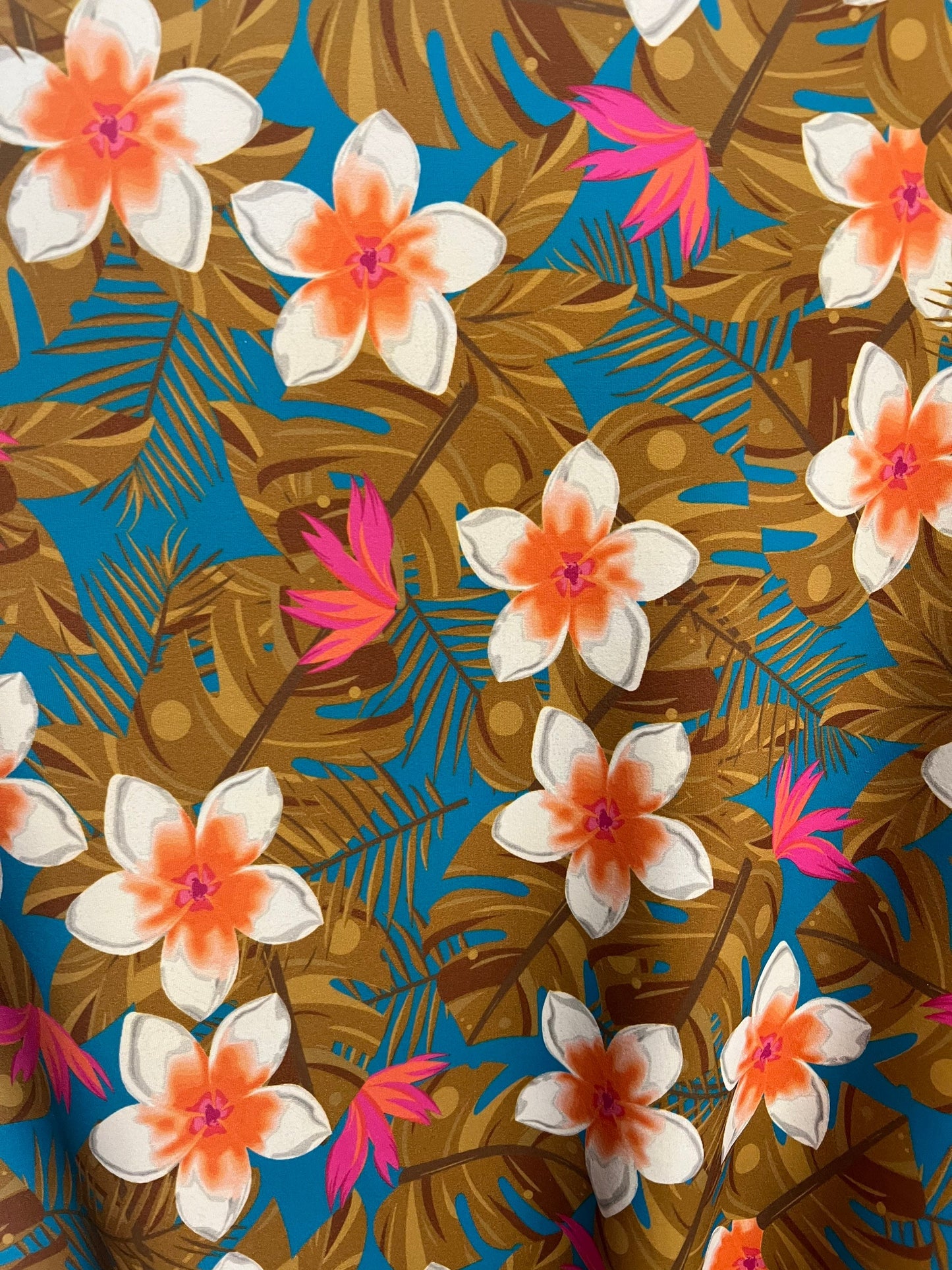 Hawaiian tropical floral design print on the best quality of nylon spandex 4-stretch 58/60”sold by the YD.ships worldwide from Los Angeles