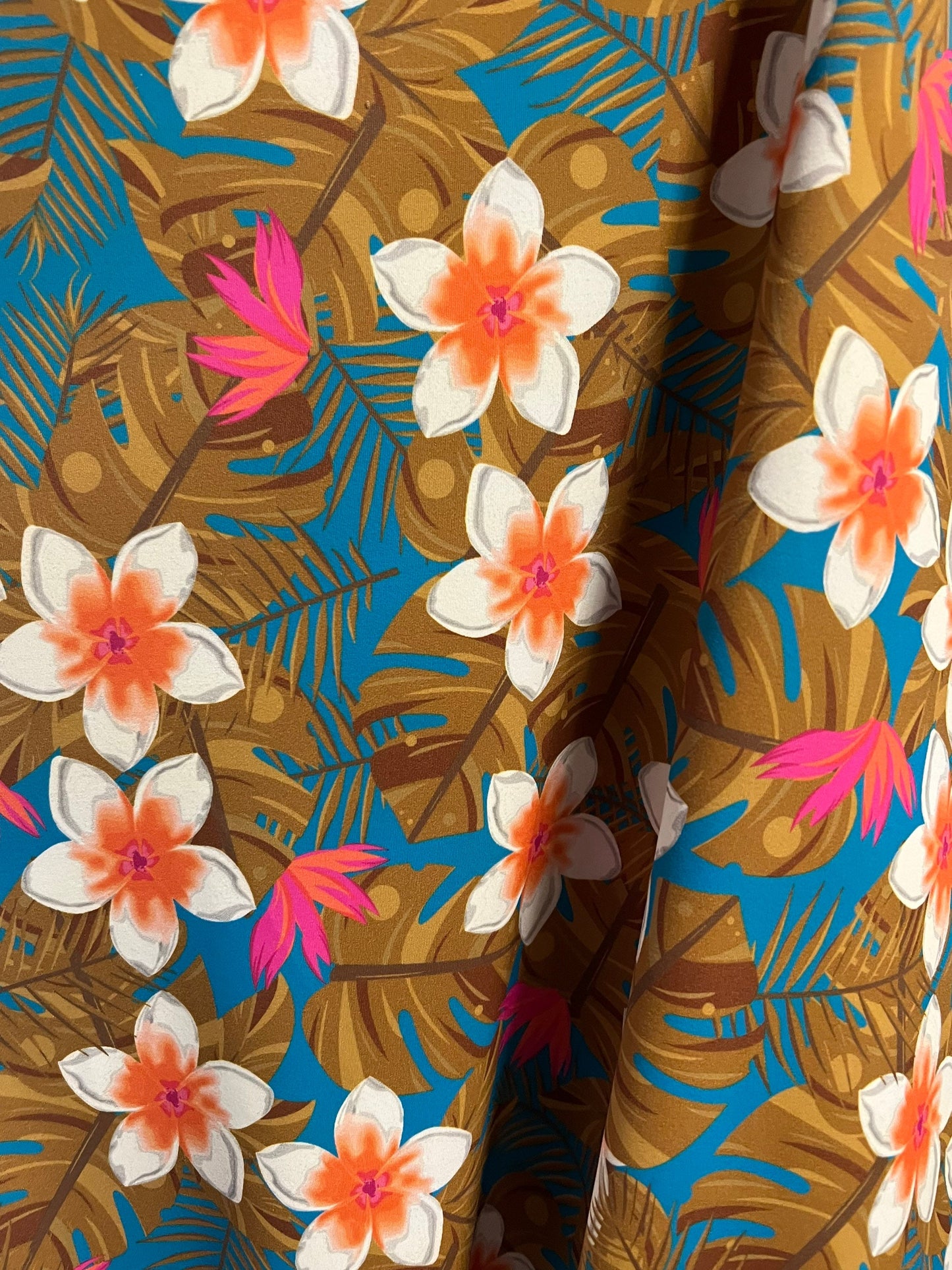 Hawaiian tropical floral design print on the best quality of nylon spandex 4-stretch 58/60”sold by the YD.ships worldwide from Los Angeles