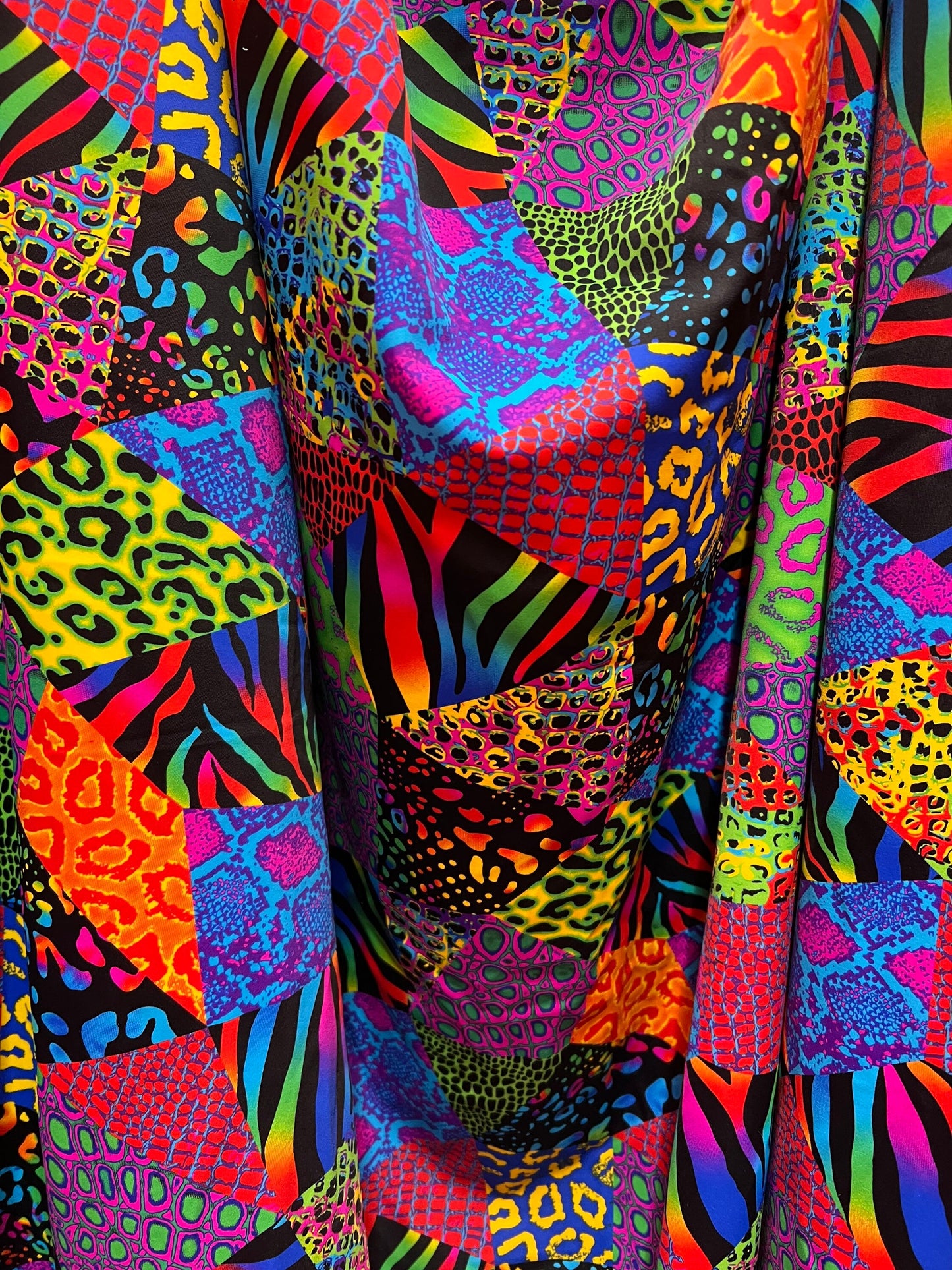 Colorful safari design print on the best quality of nylon spandex 4-stretch 58/60”sold by the YD.ships worldwide from Los Angeles California