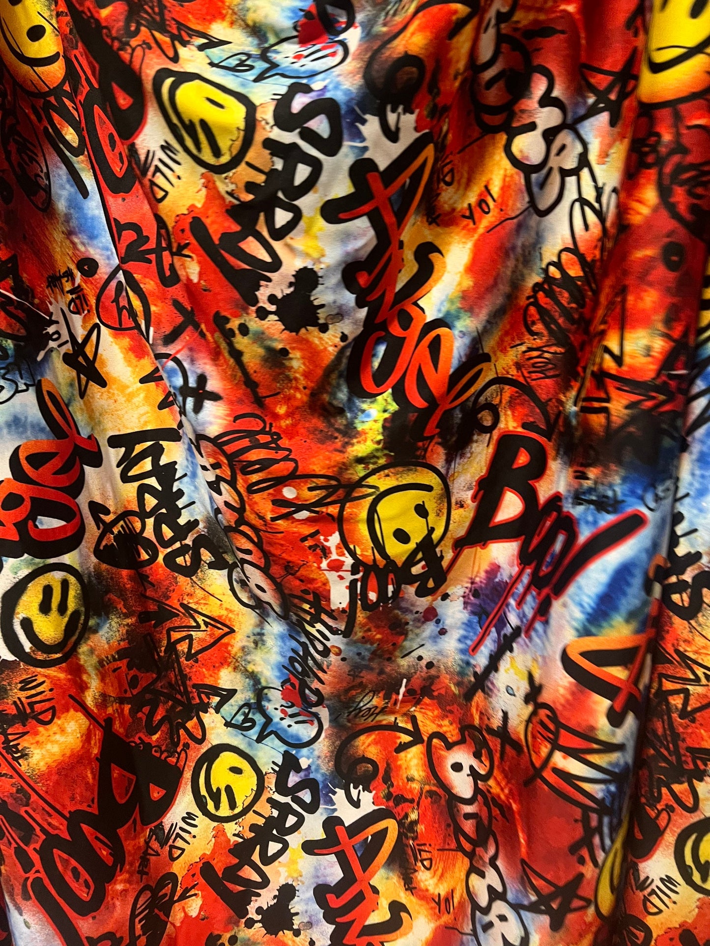 Graffiti art design print on the best quality of nylon spandex 4-stretch 58/60”sold by the YD.ships worldwide from Los Angeles California.