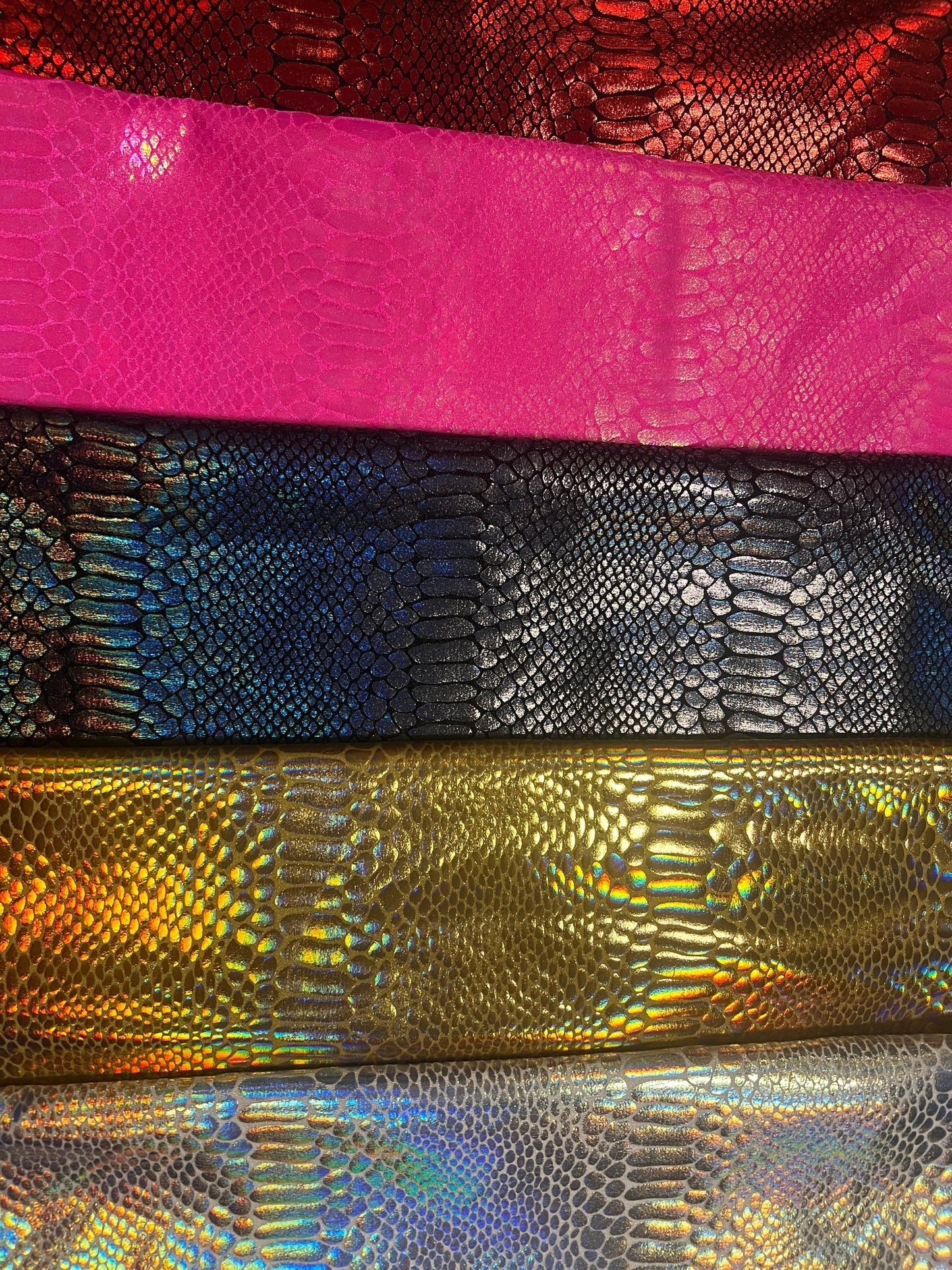 New iridescent foil snake skin design nylon spandex 4-stretch 58/60”sold by the YD.ships worldwide from Los Angeles California USA.