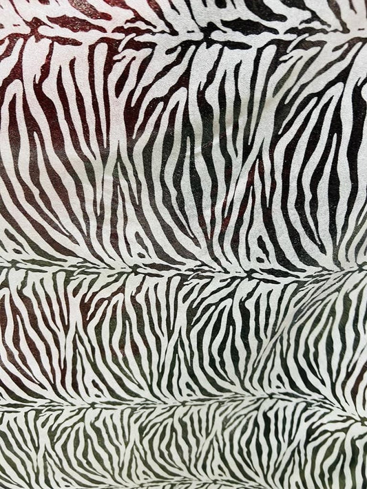 New exotic zebra design with all over foil metallic nylon spandex 4-stretch 58/60”sold by the YD.ships worldwide from Los Angeles California