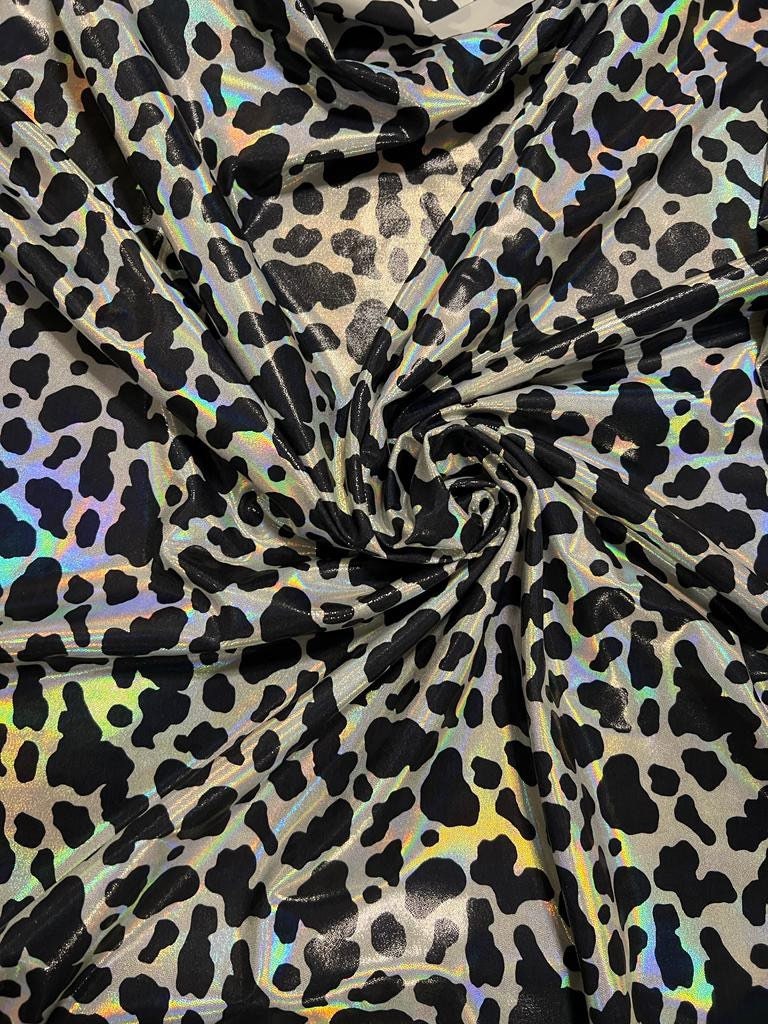 New Cow design iridescent metallic mystique nylon spandex 4-stretch 58/60”sold by the YD.ships worldwide from Los Angeles California USA.