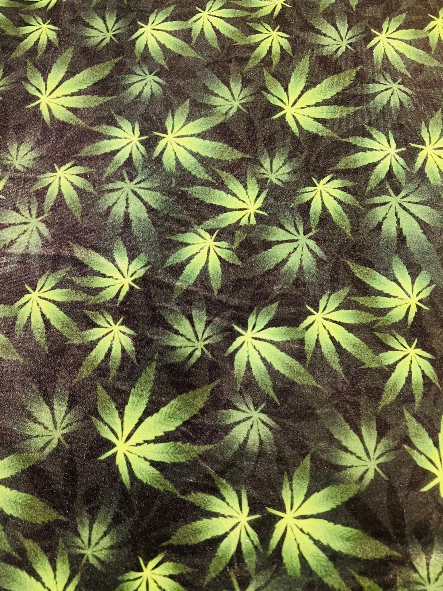 New cannabis leaf print on great quality of stretch velvet 4/way stretch 58/60” sold by the YD.ships worldwide from Los Angeles California.